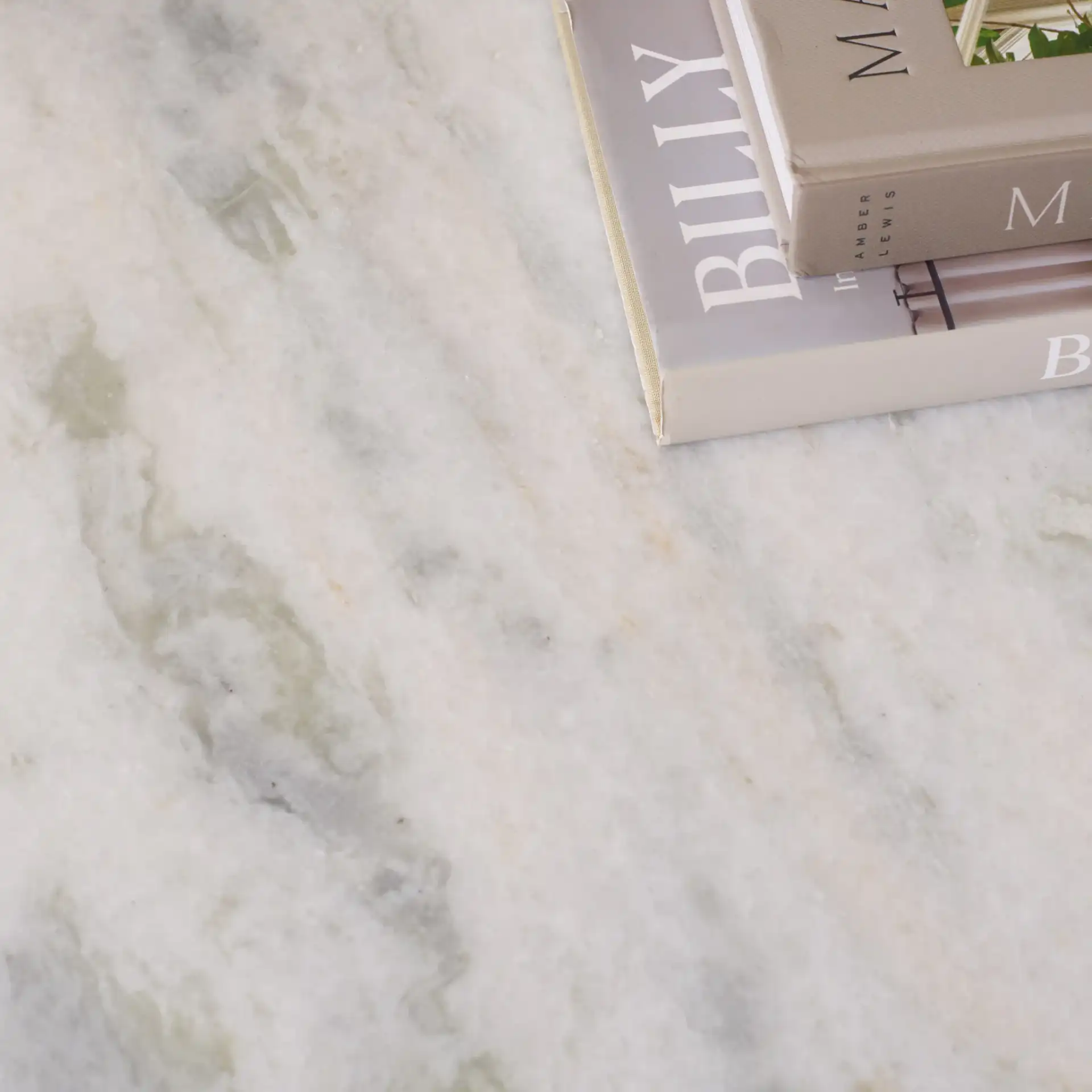Zemfira Marble Console Table in White / Natural in a styled room