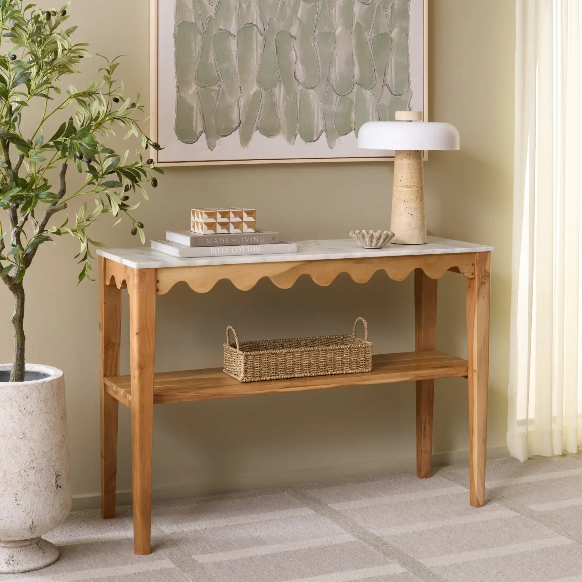Zemfira Marble Console Table in White / Natural in a styled room