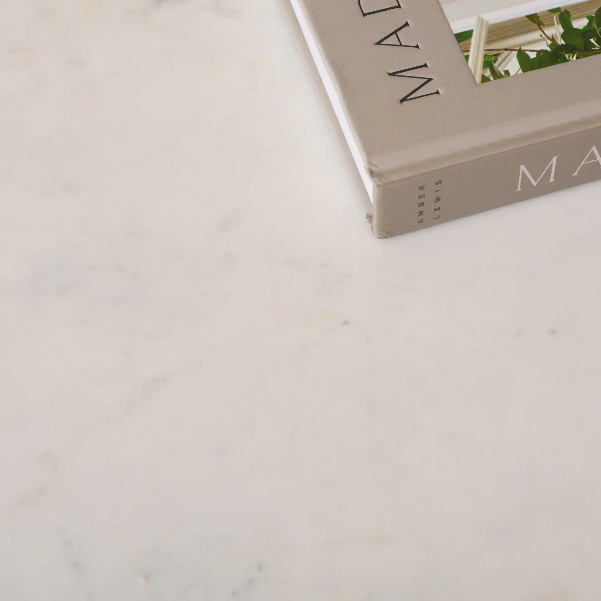Raisa Marble Console Table in White / Black in a styled room