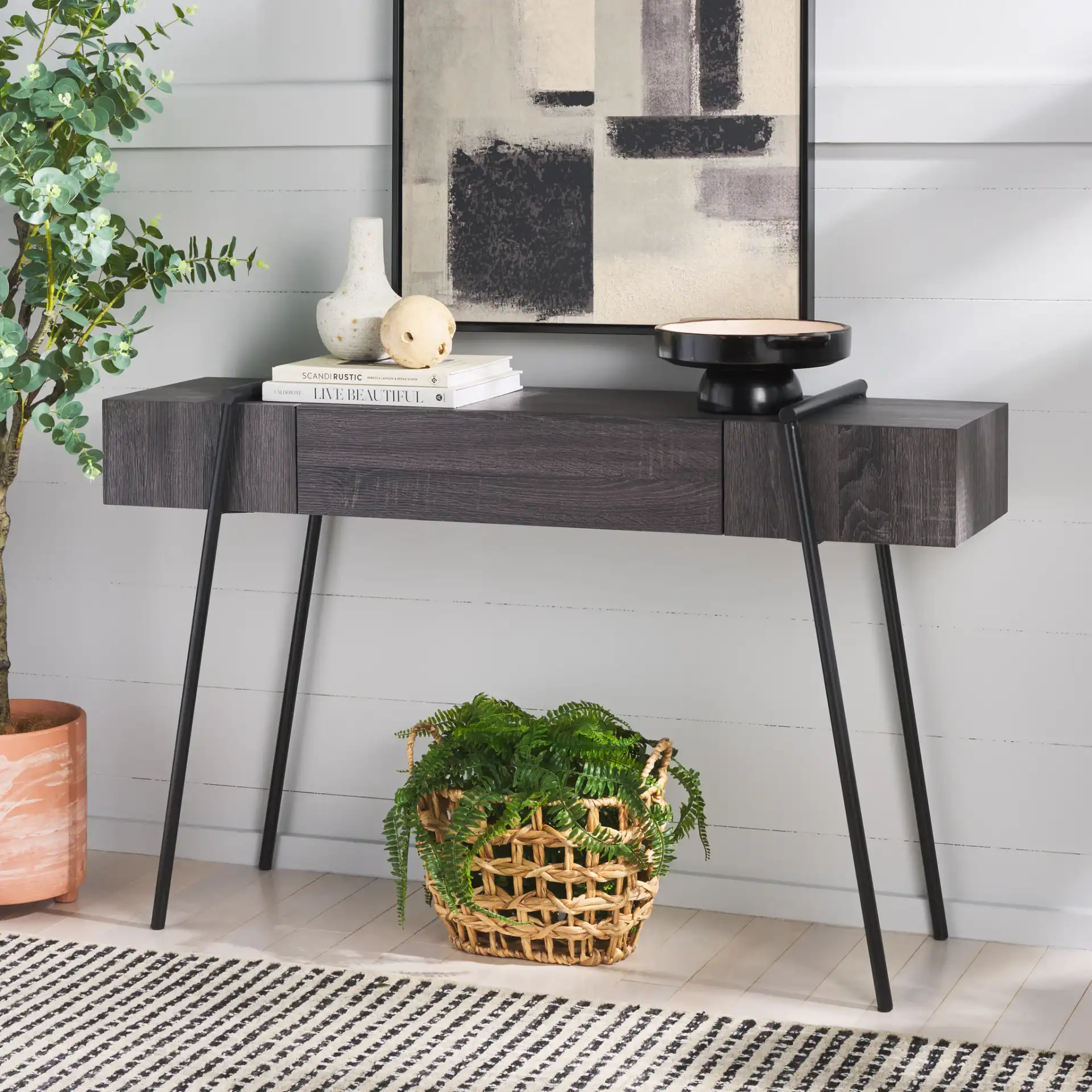 Margaux Console Table in Dark Gray Oak / Black in a styled room