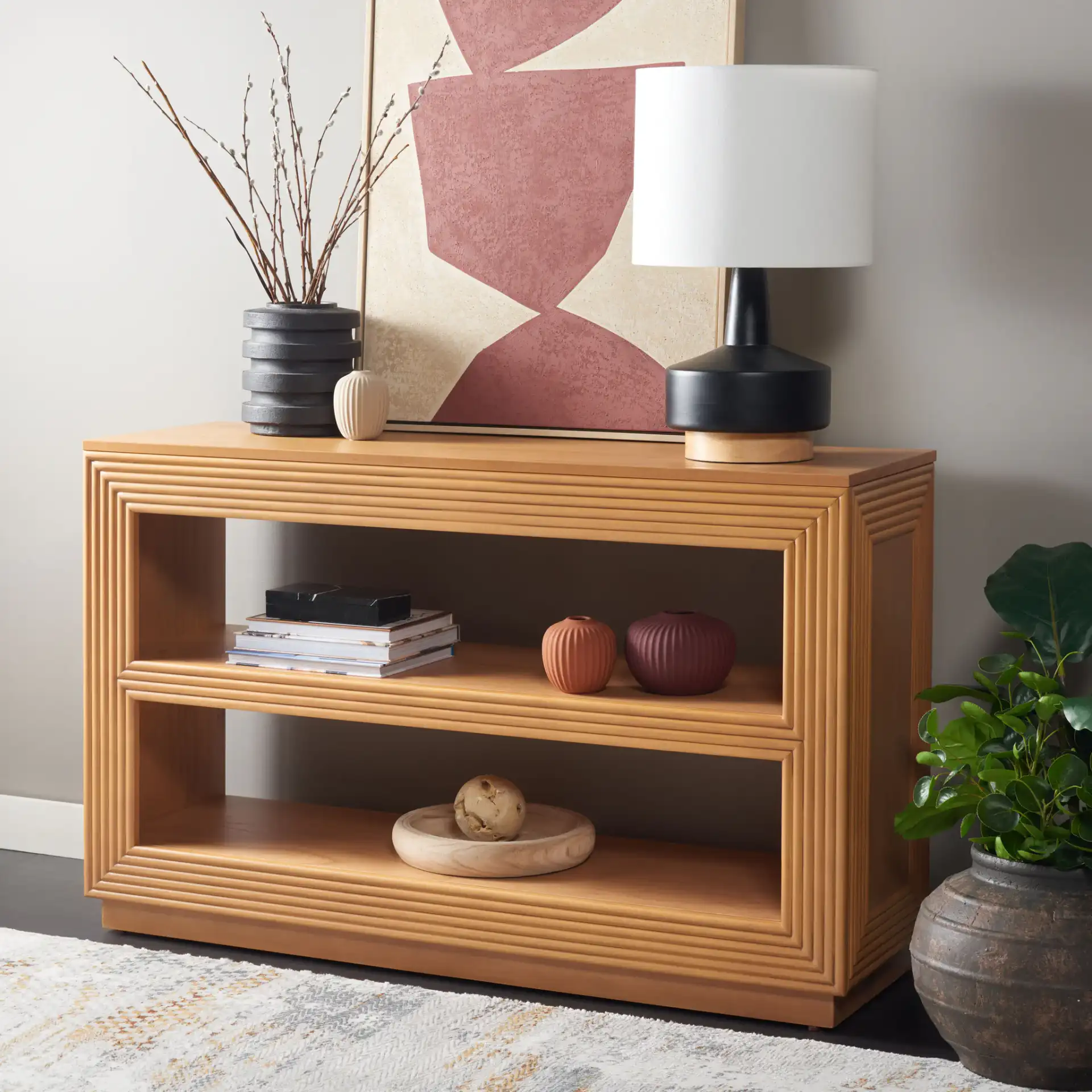 Ines Console Table in Natural in a styled room