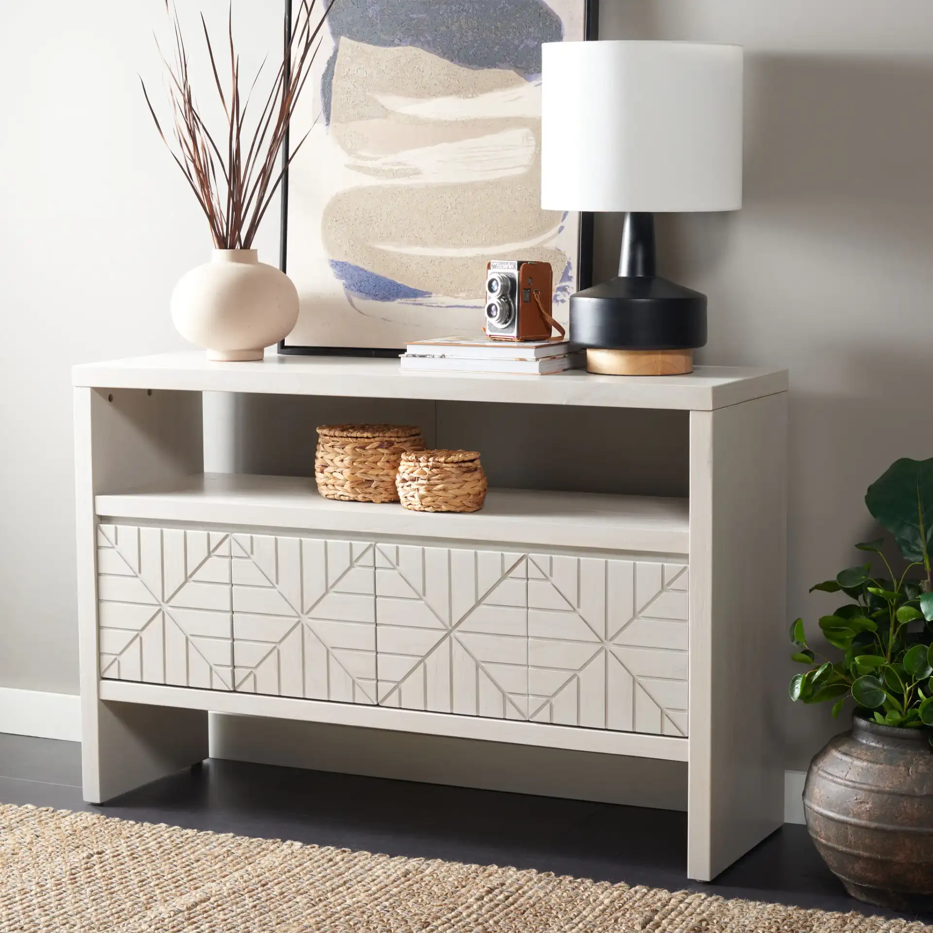 Zella Four-Door Console Table in White Washed in a styled room