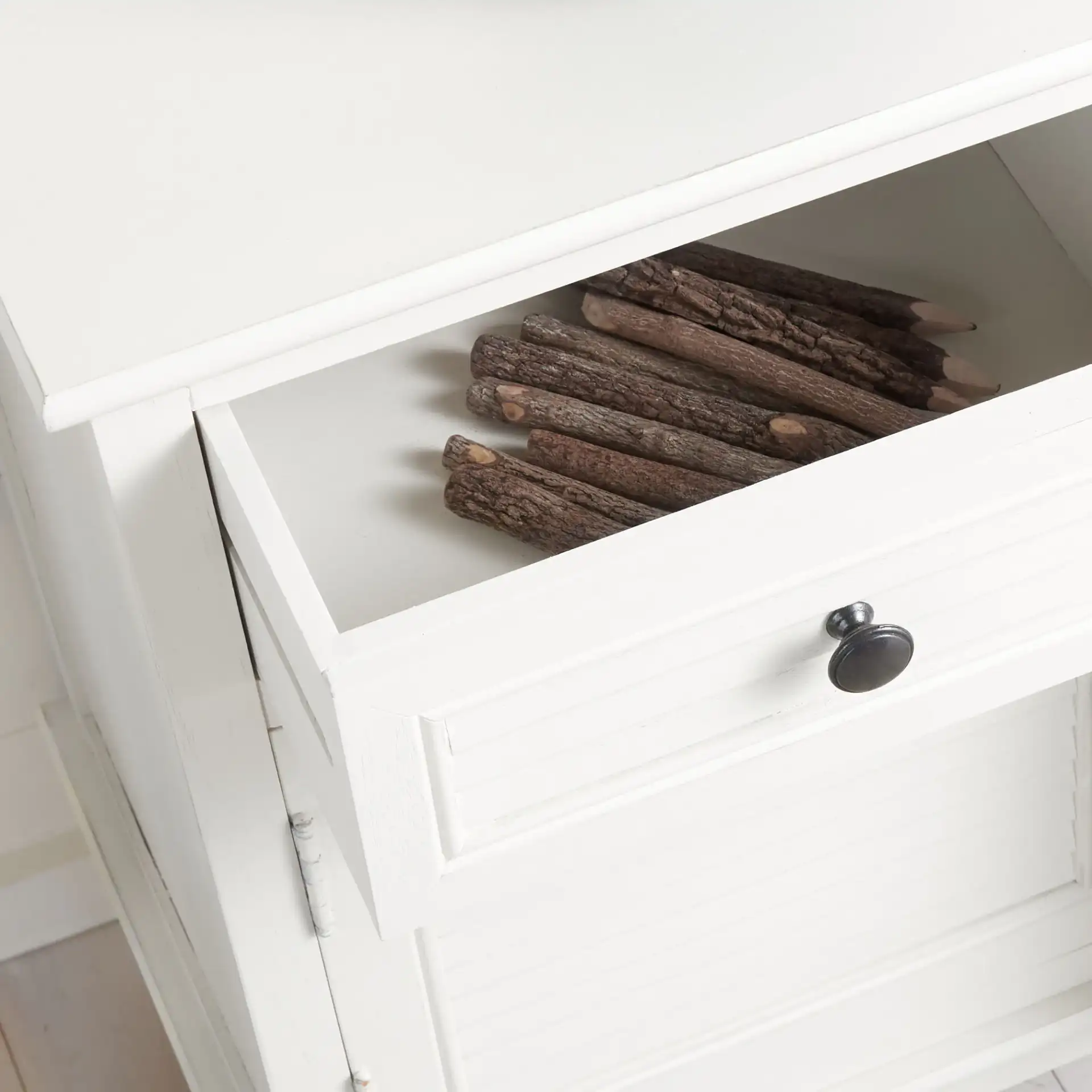 Tate Two-Drawer Two-Door Sideboard in Greige in a styled room