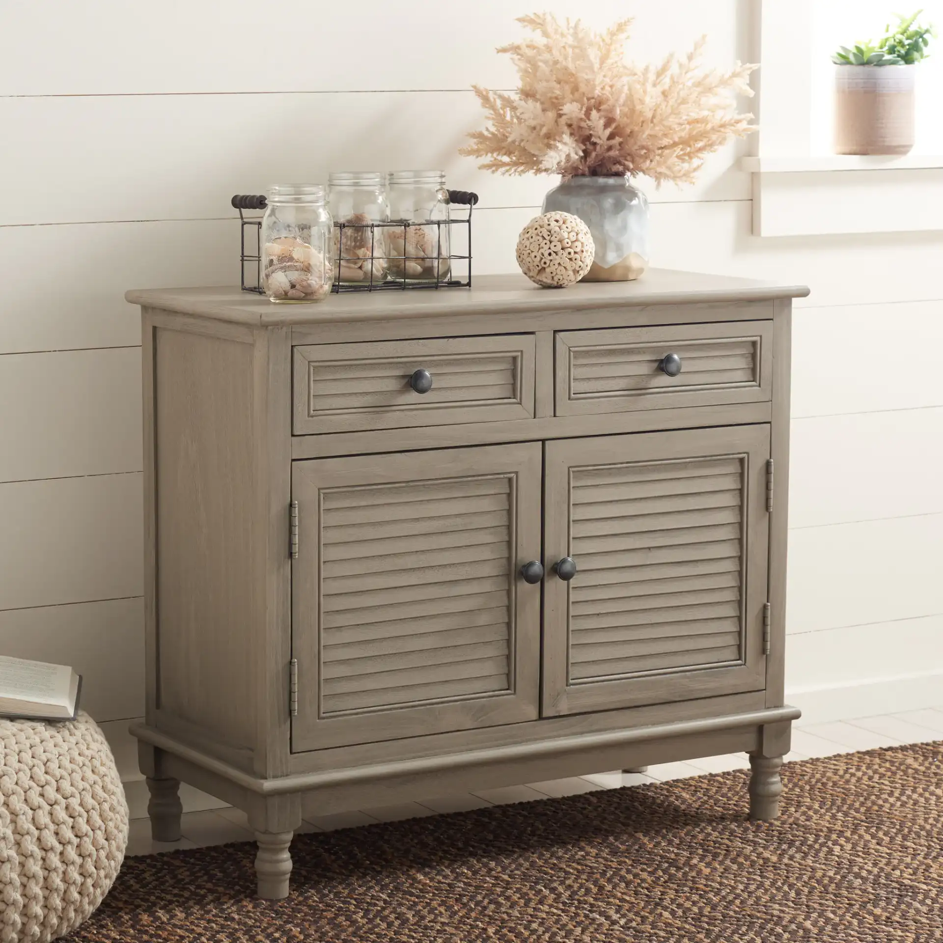 Tate Two-Drawer Two-Door Sideboard in Greige in a styled room