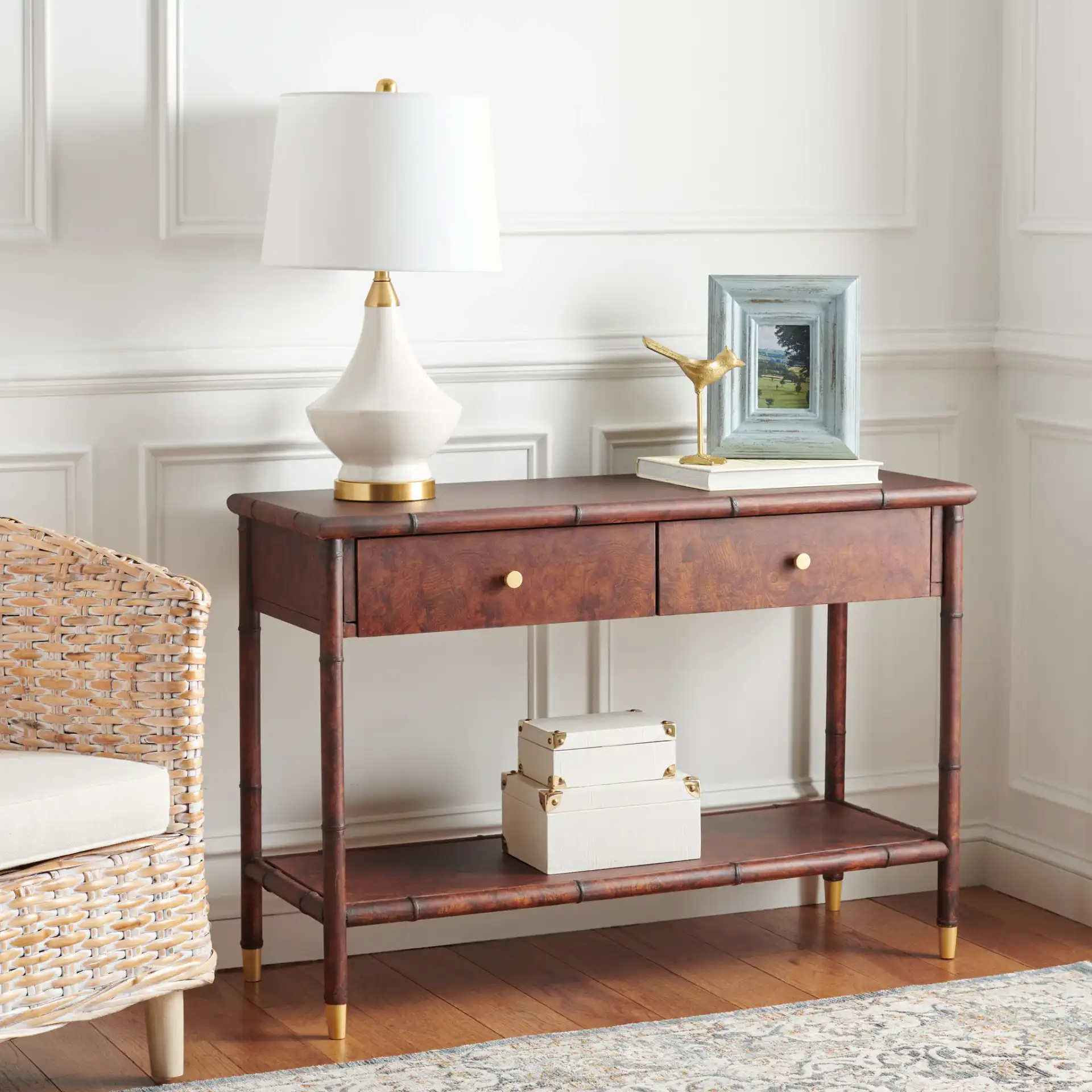 Tudor Two-Drawer One-Shelf Console Table in Dark Brown / Gold in a styled room