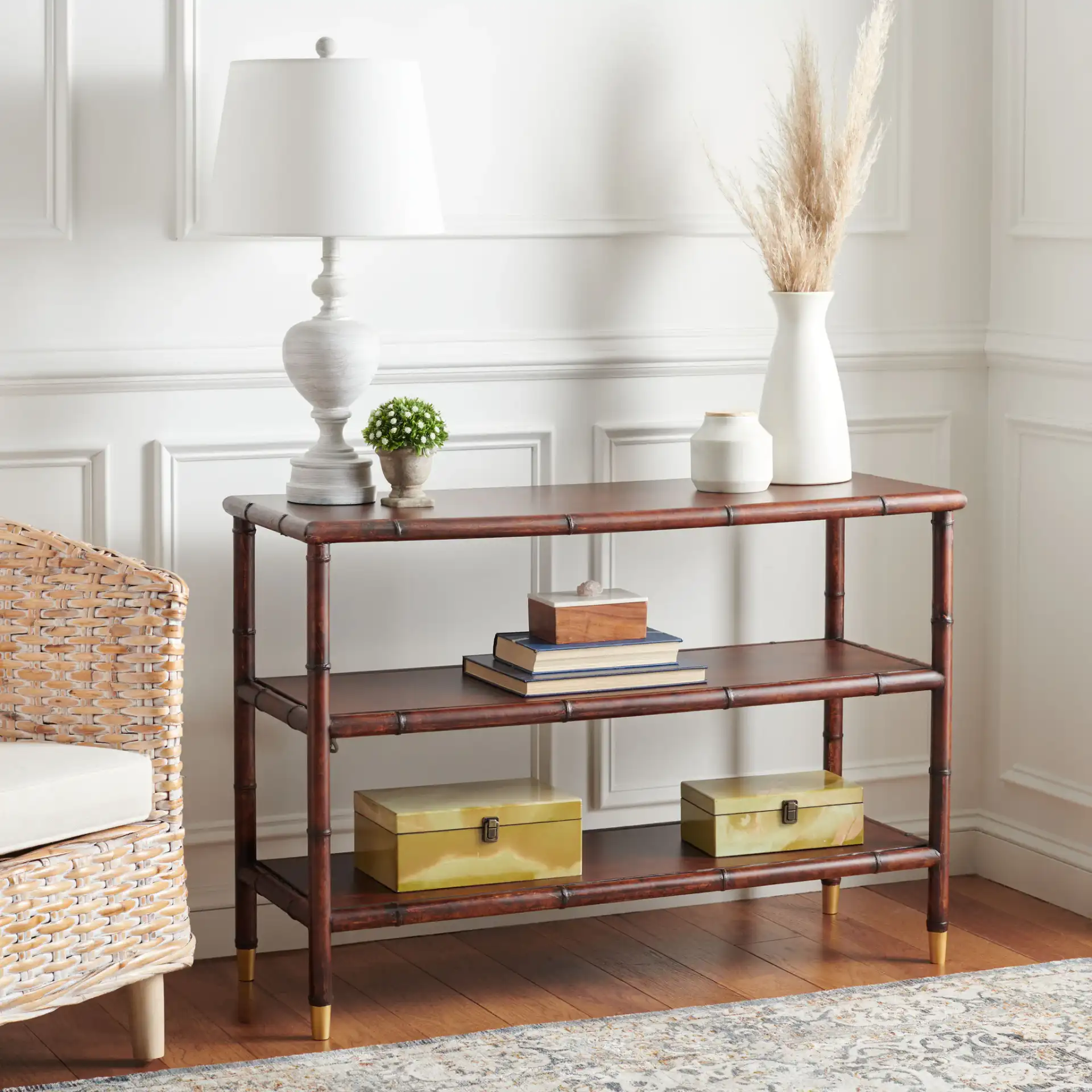 Tudor Two-Shelf Console Table in Dark Brown / Gold in a styled room