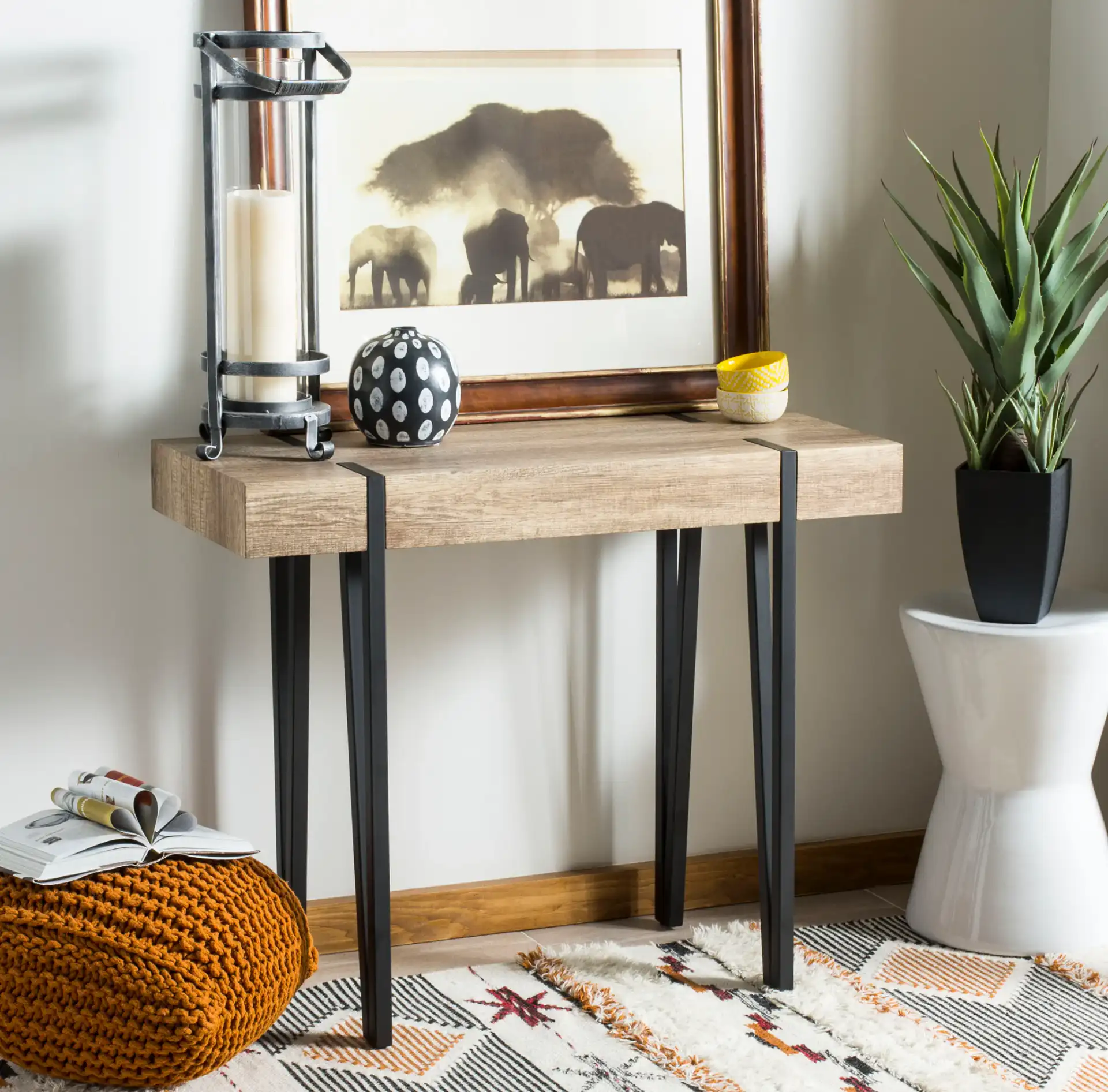 Alyssa Console Table in Multicolor / Brown / Black in a styled room