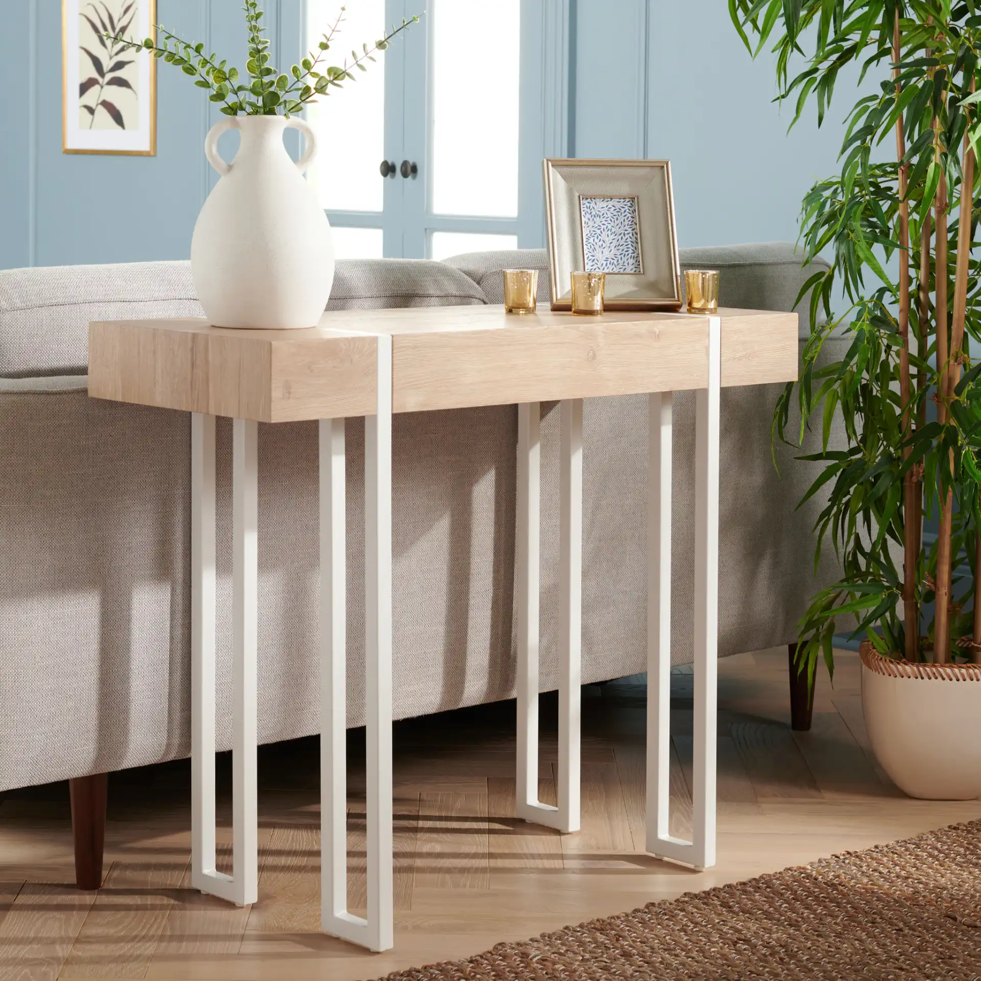 Aberton Console Table in Natural / White in a styled room