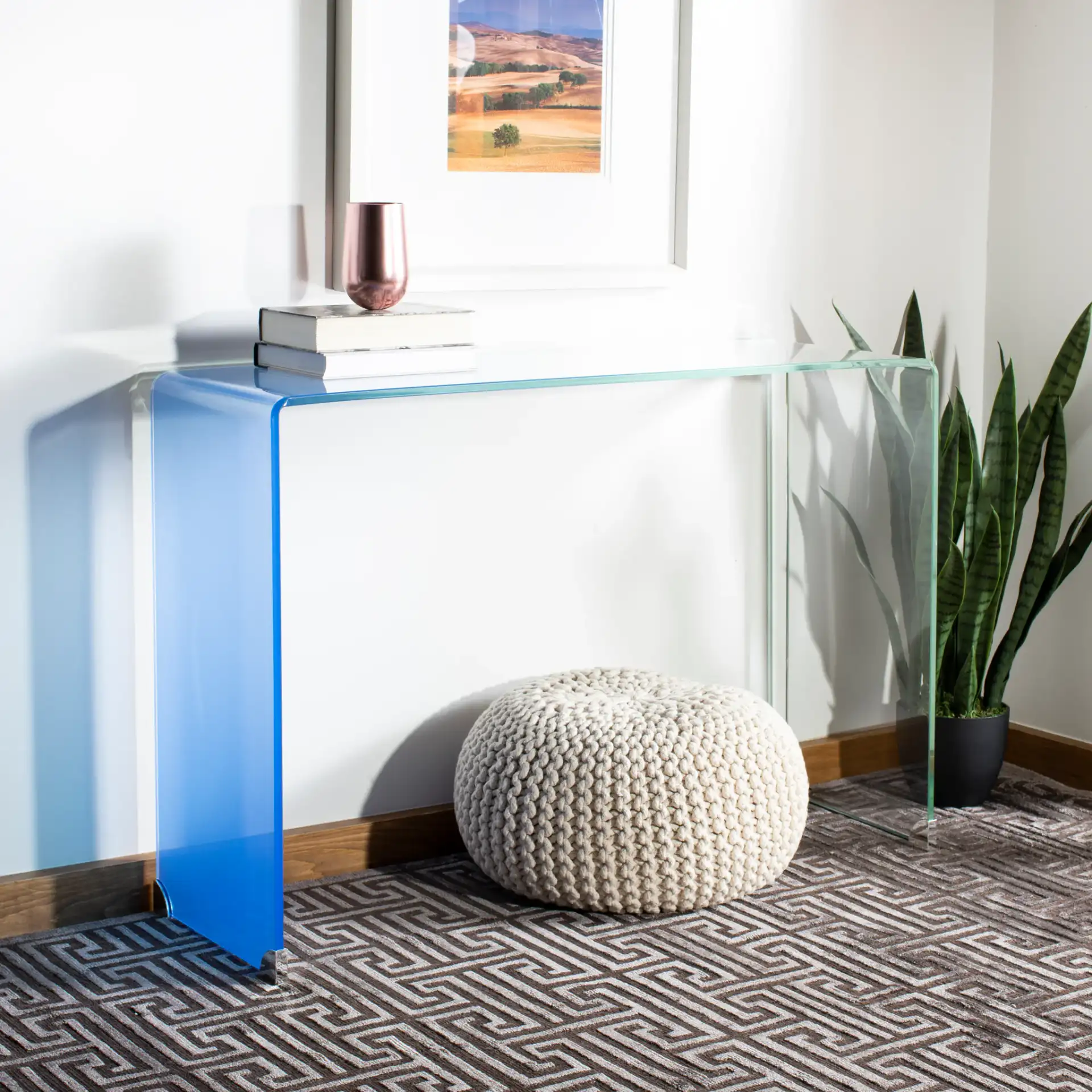 Crysta Ombre Glass Console Table in Clear / Blue in a styled room