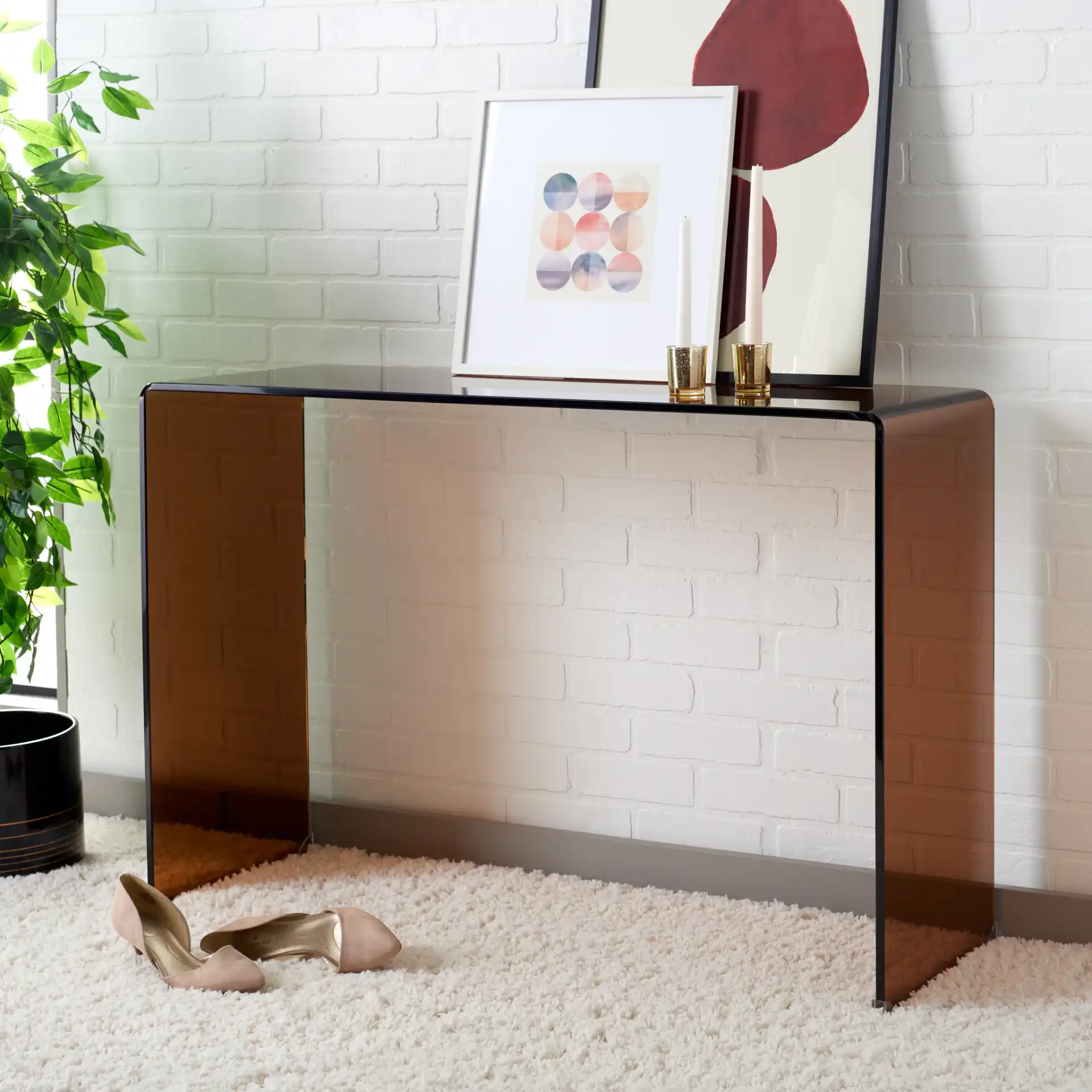 Taft Tempered Glass Console Table in Tea Glass in a styled room