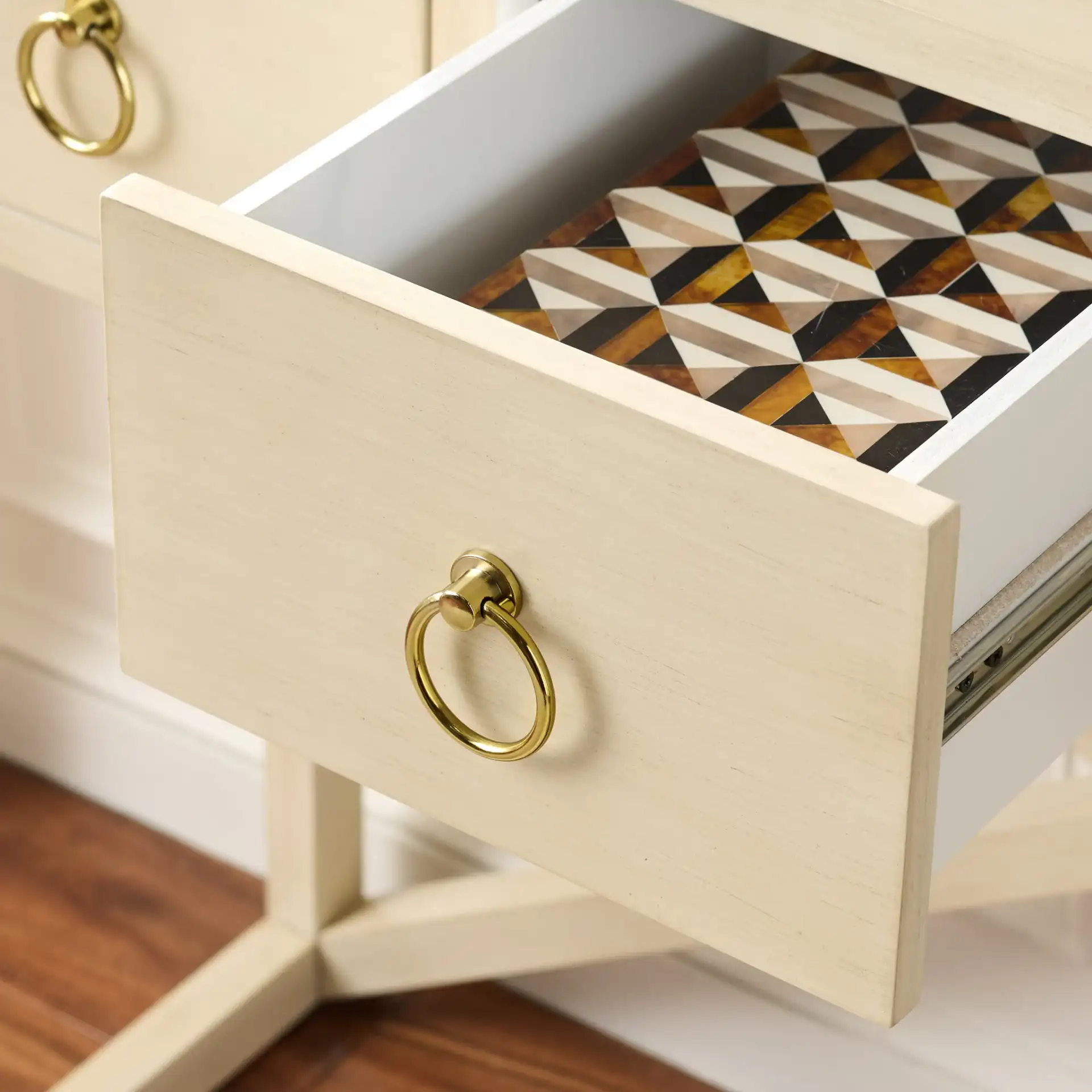 Sadie Three-Drawer Console Table in Antique / White in a styled room