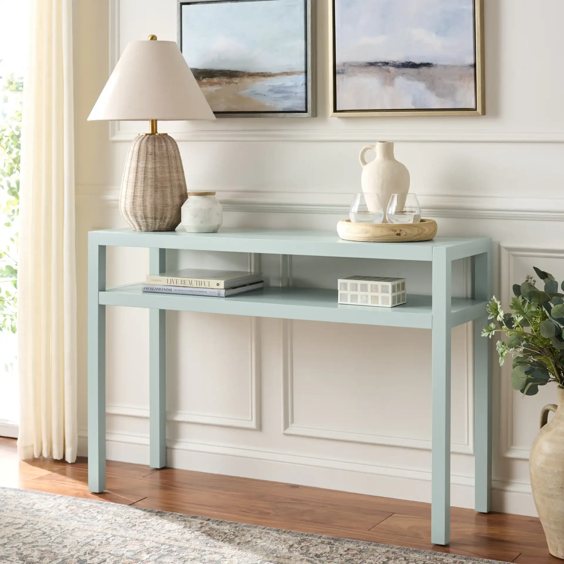 Aeryn One-Shelf Console Table in Light Blue in a styled room