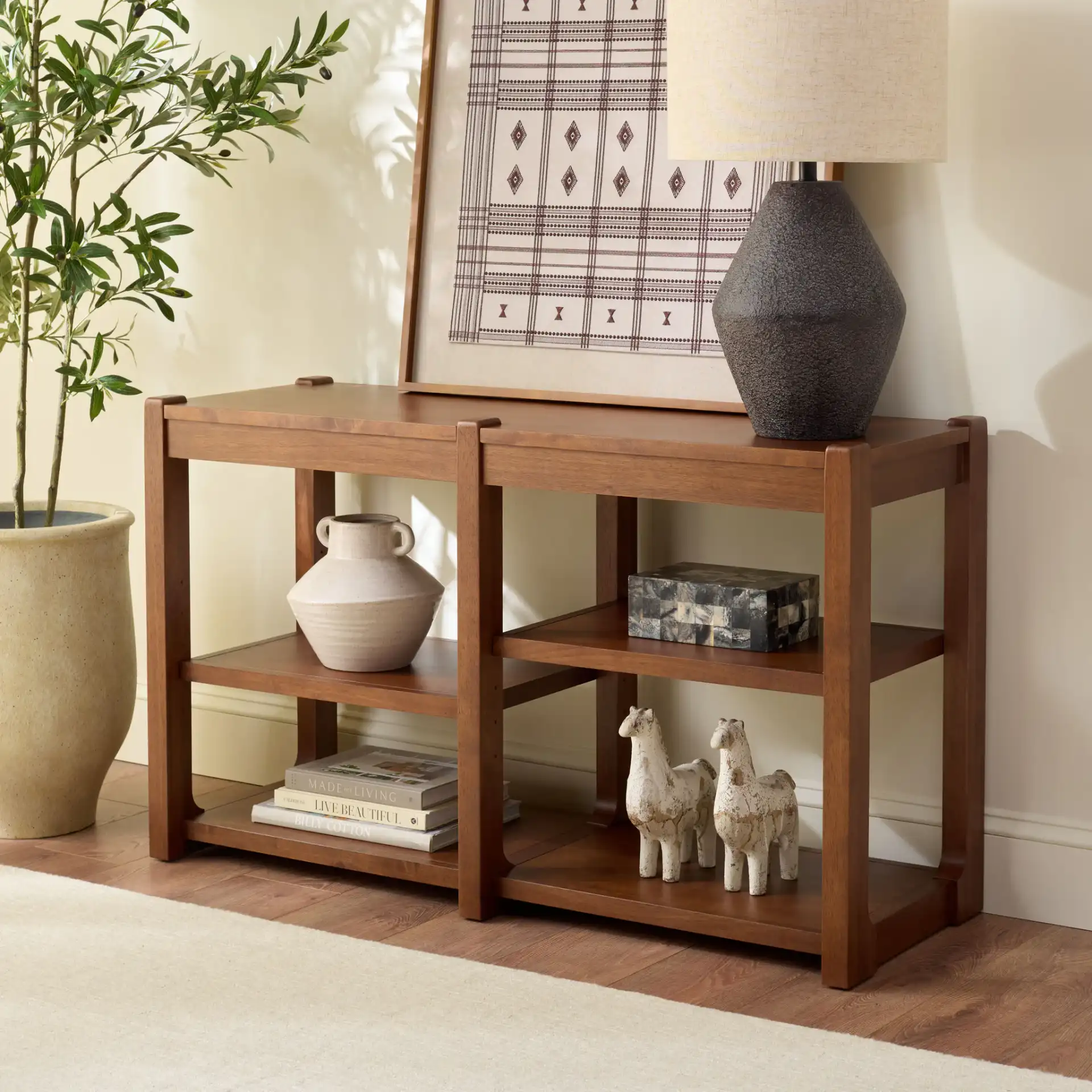 Telma Adjustable Shelves Console Table in Dark Walnut in a styled room