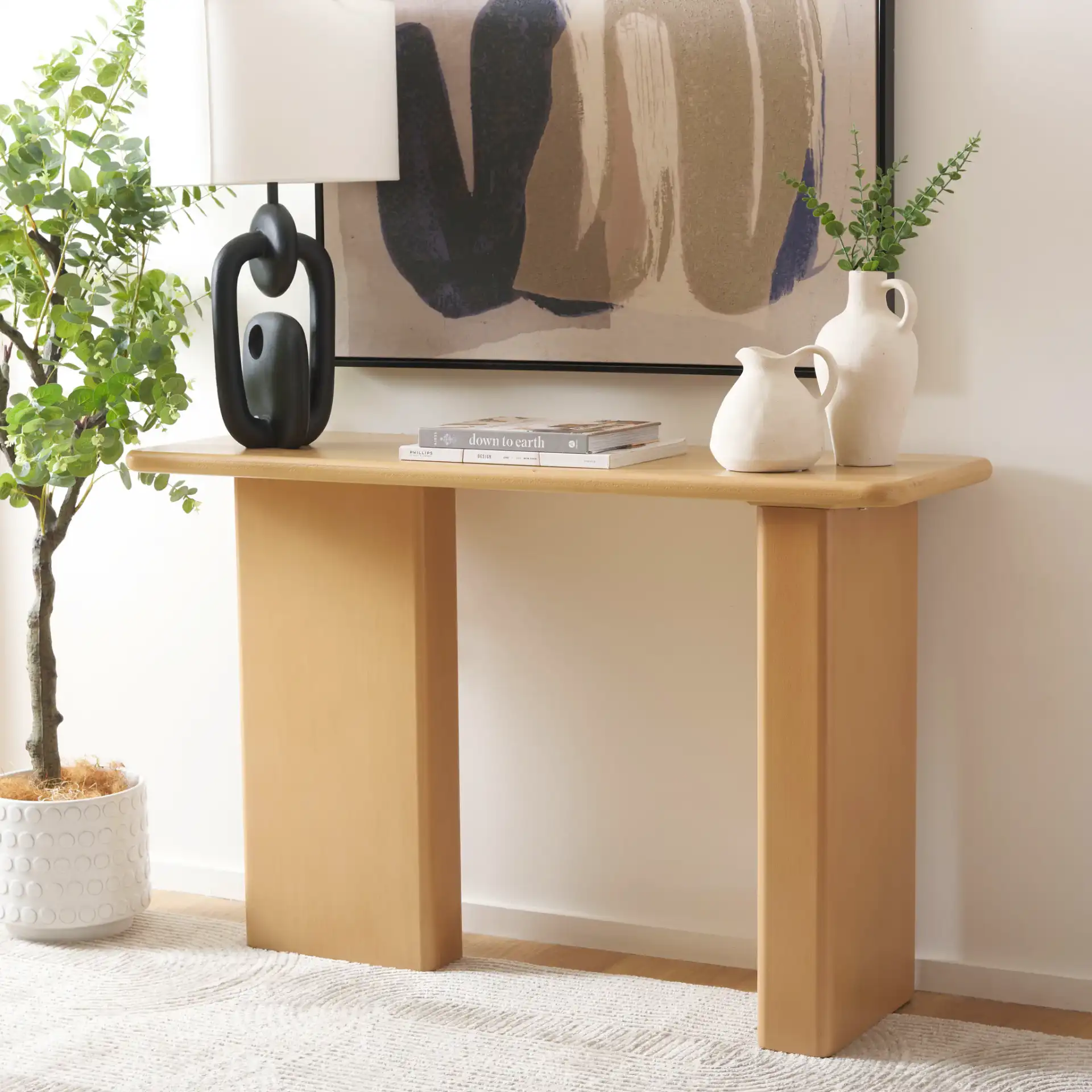 Enyo Console Table in Natural in a styled room
