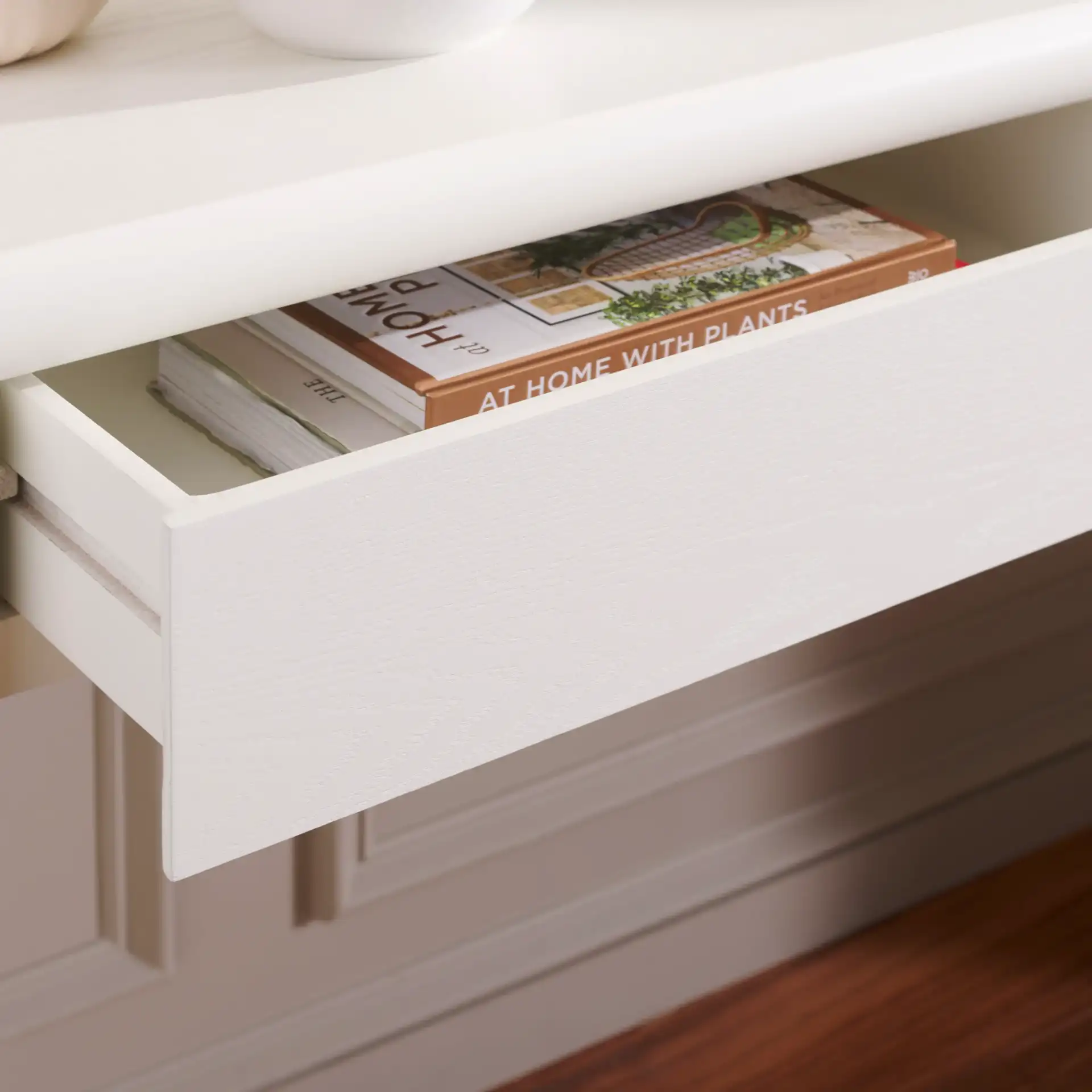 Rune Console Table With Drawers in Ivory in a styled room