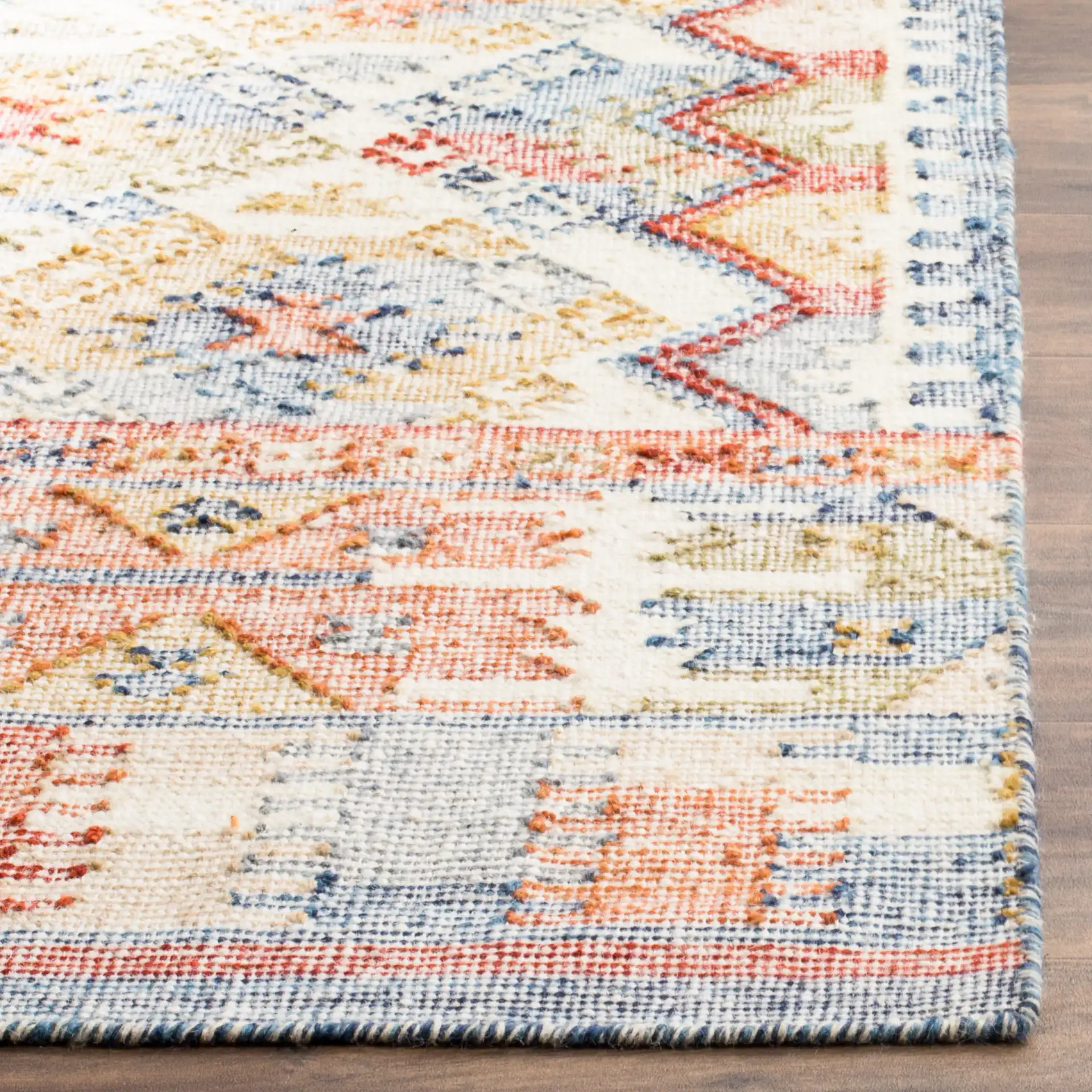 Canyon Tribal Diamond Hand-Woven Rug in Ivory / Multicolor in a styled room