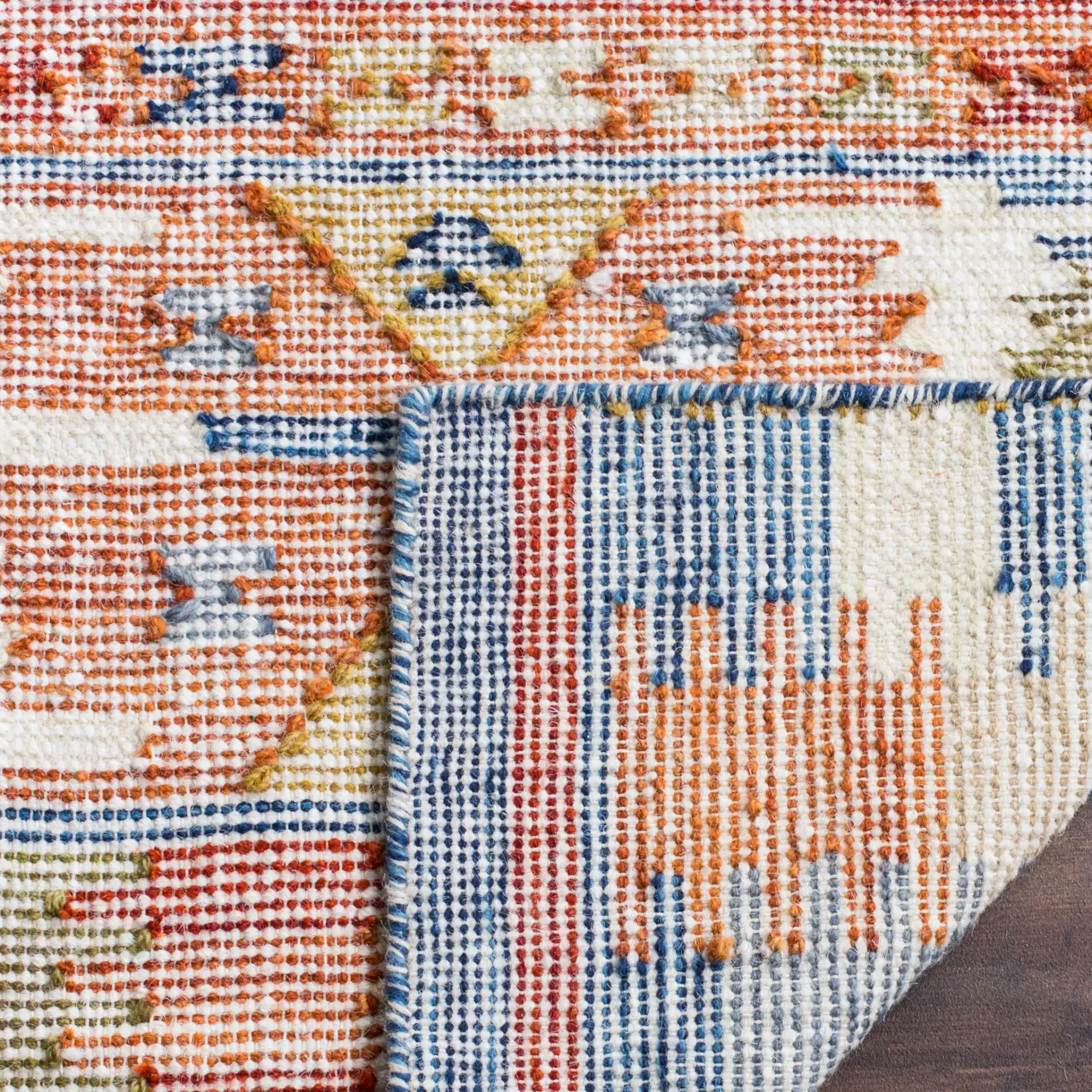 Canyon Tribal Diamond Hand-Woven Rug in Ivory / Multicolor in a styled room