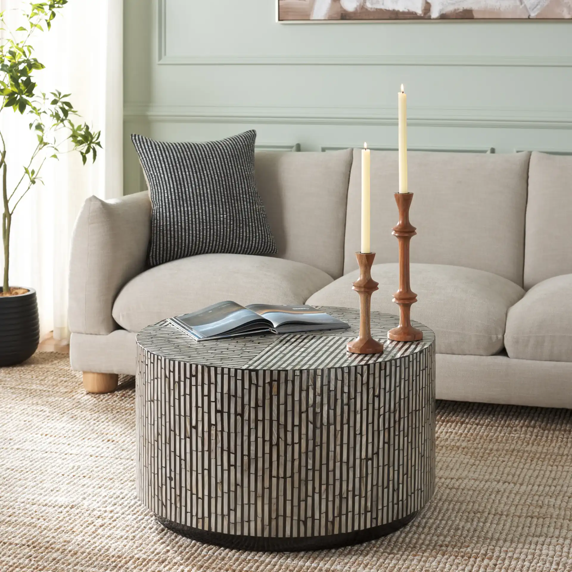 Hamza Round Coffee Table in Multicolor / Black in a styled room