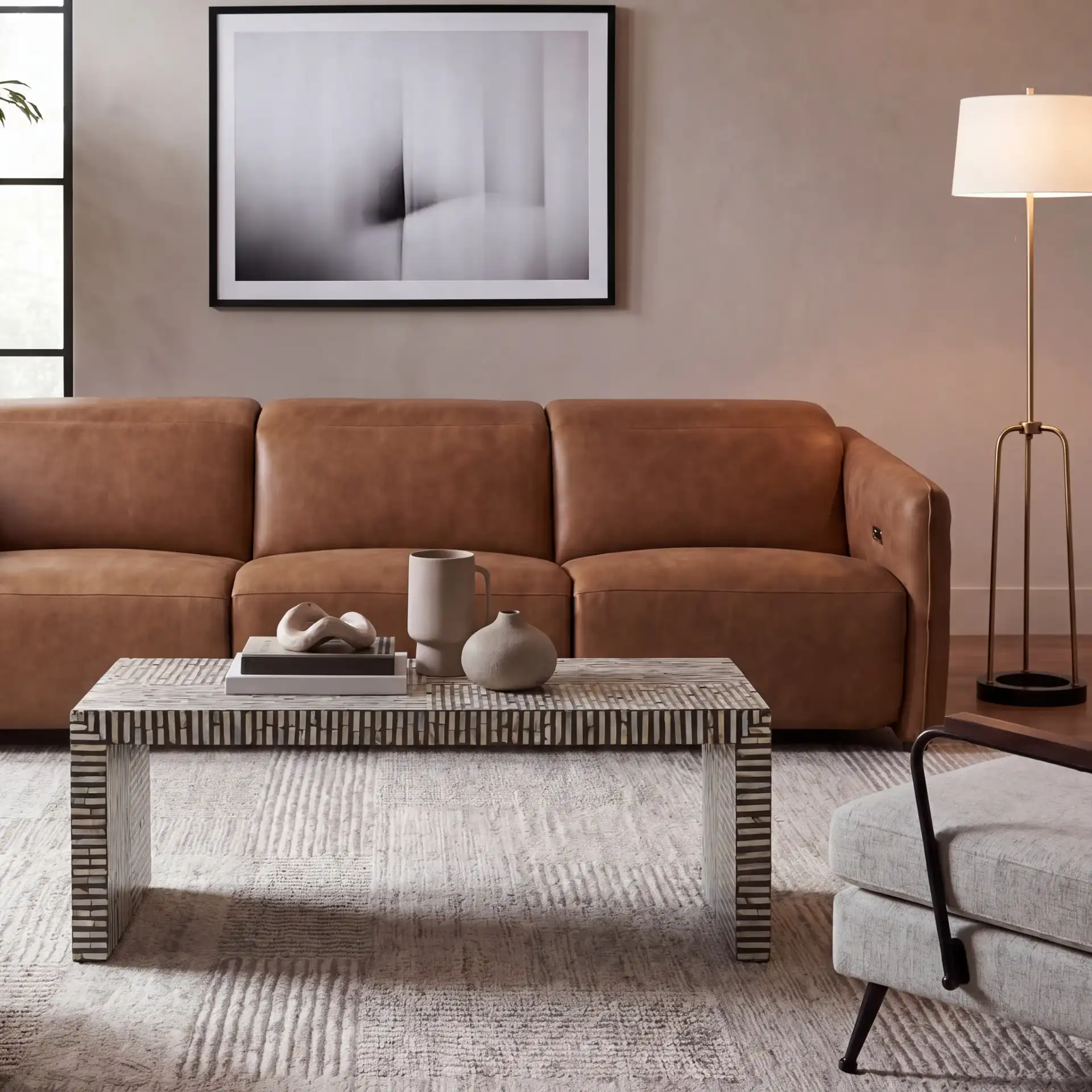 Hamza Rectangle Coffee Table in Multicolor / Black in a styled room