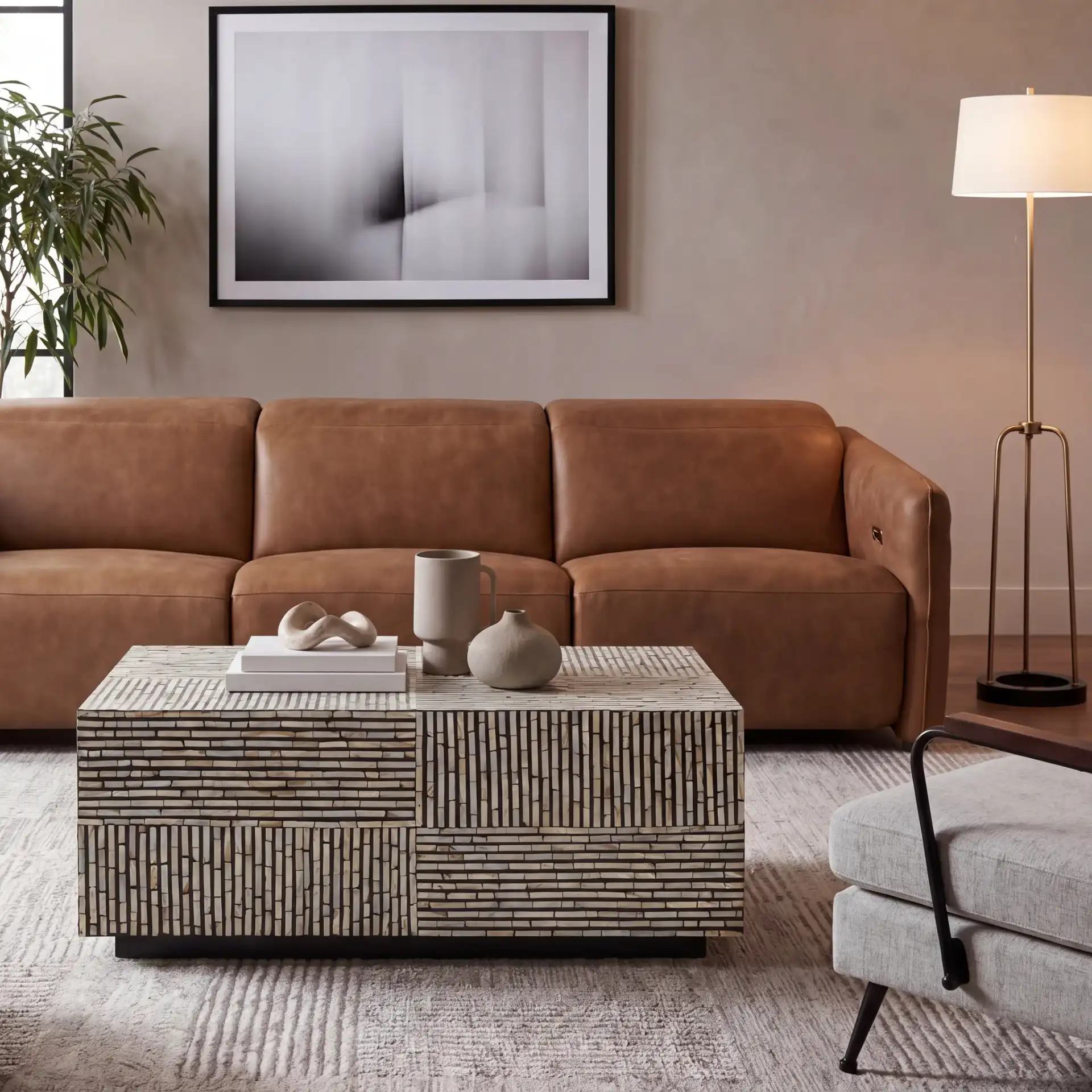 Hamza Rectangular Prism Coffee Table in Multicolor / Black in a styled room