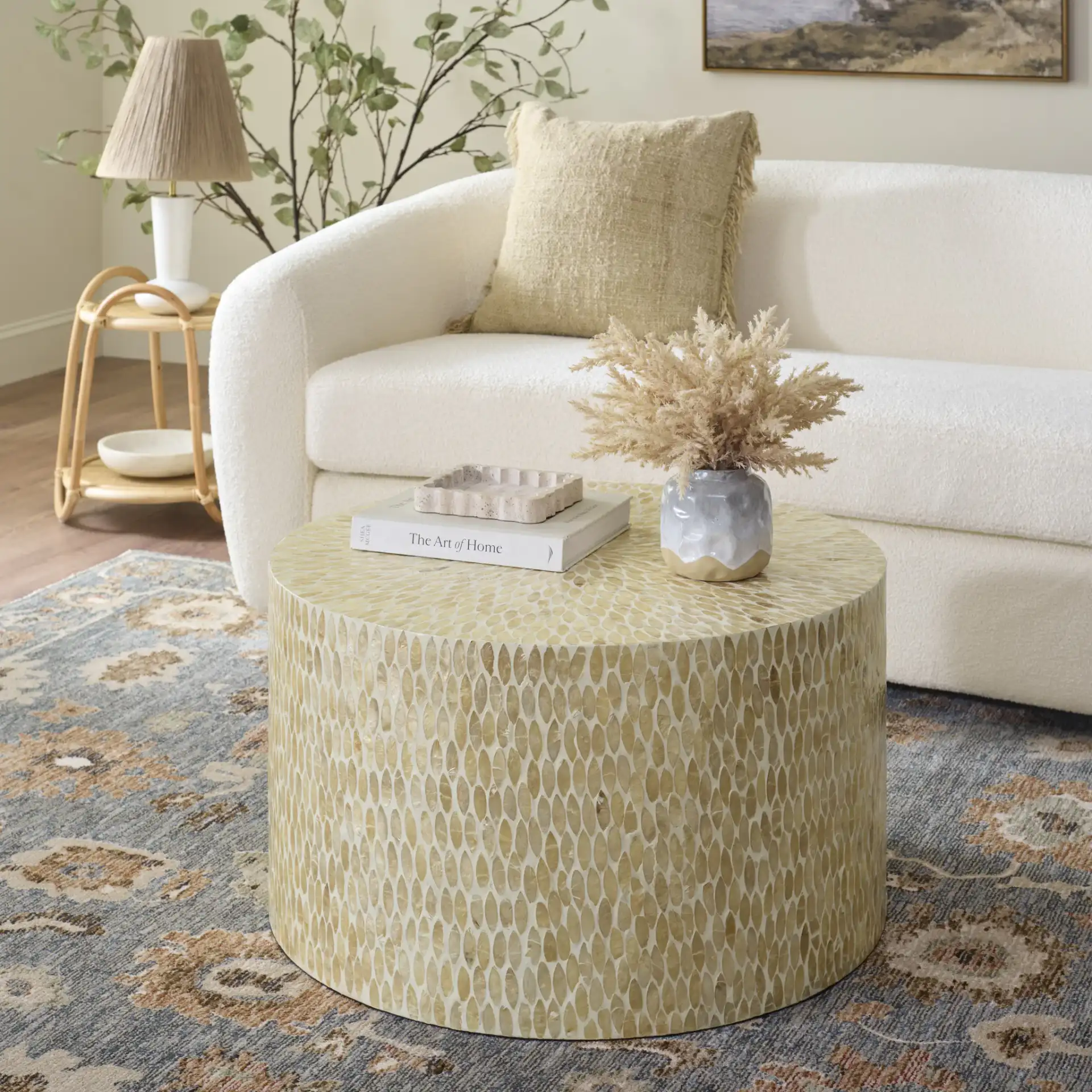 Analia Round Coffee Table in Beige in a styled room