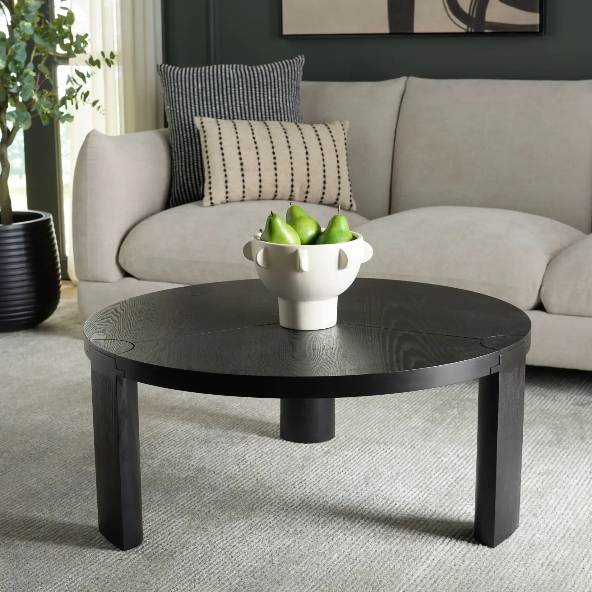 Gaby Round Coffee Table in Black in a styled room