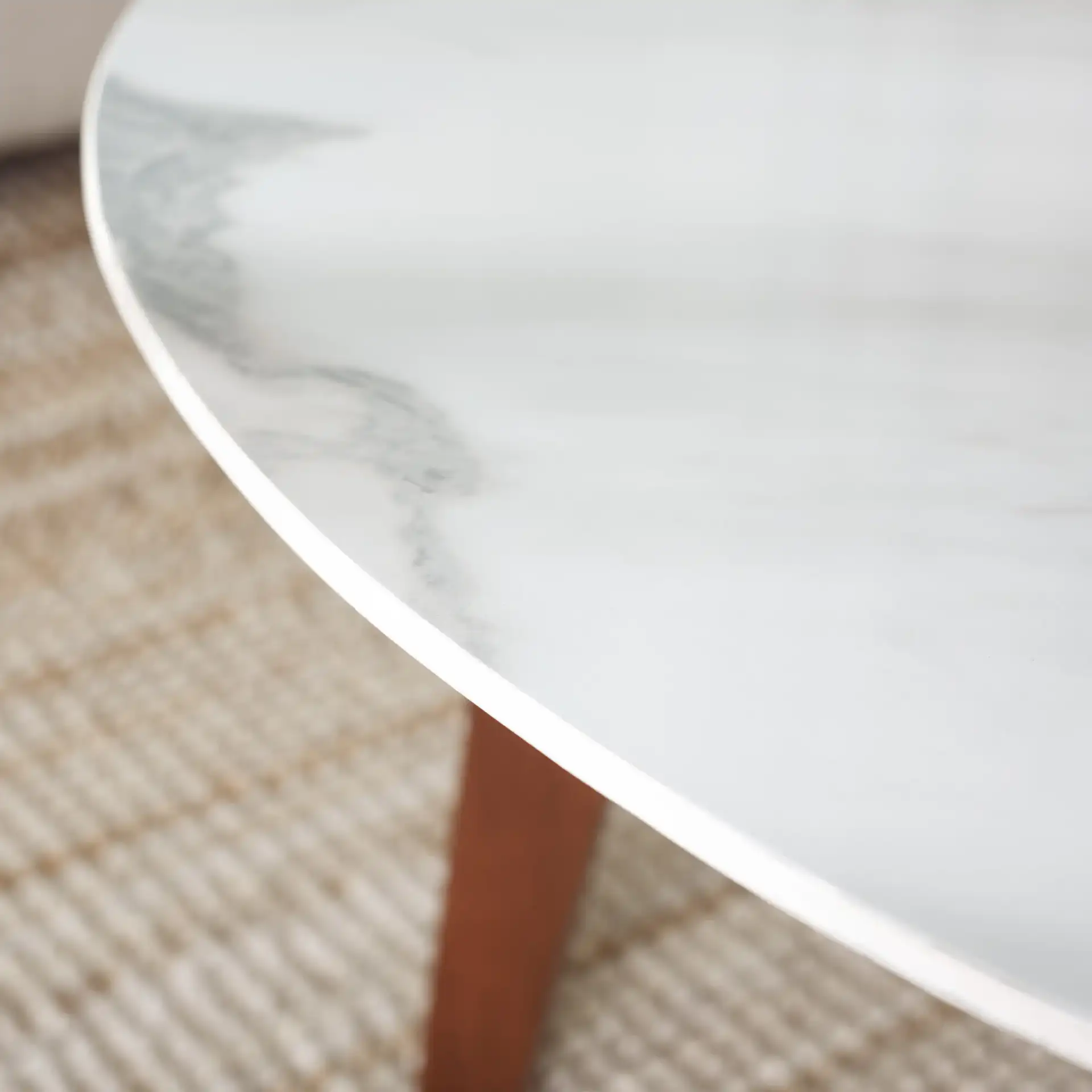 Ulmani Coffee Table in White Ceramic Faux Marble / Walnut in a styled room
