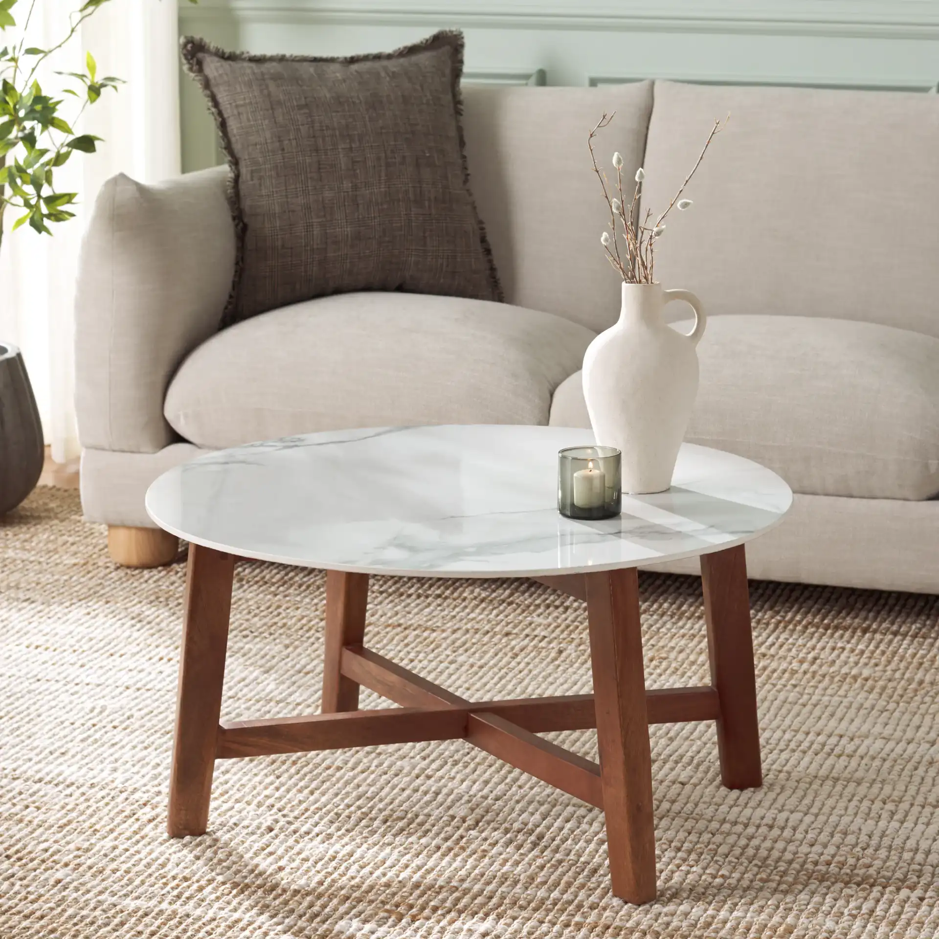 Samie Coffee Table in White Ceramic Faux Marble / Walnut in a styled room
