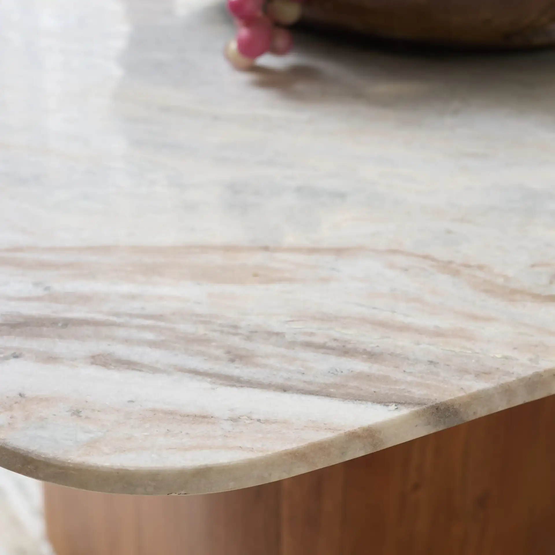 Alessio Marble Side Table in Brown / White in a styled room