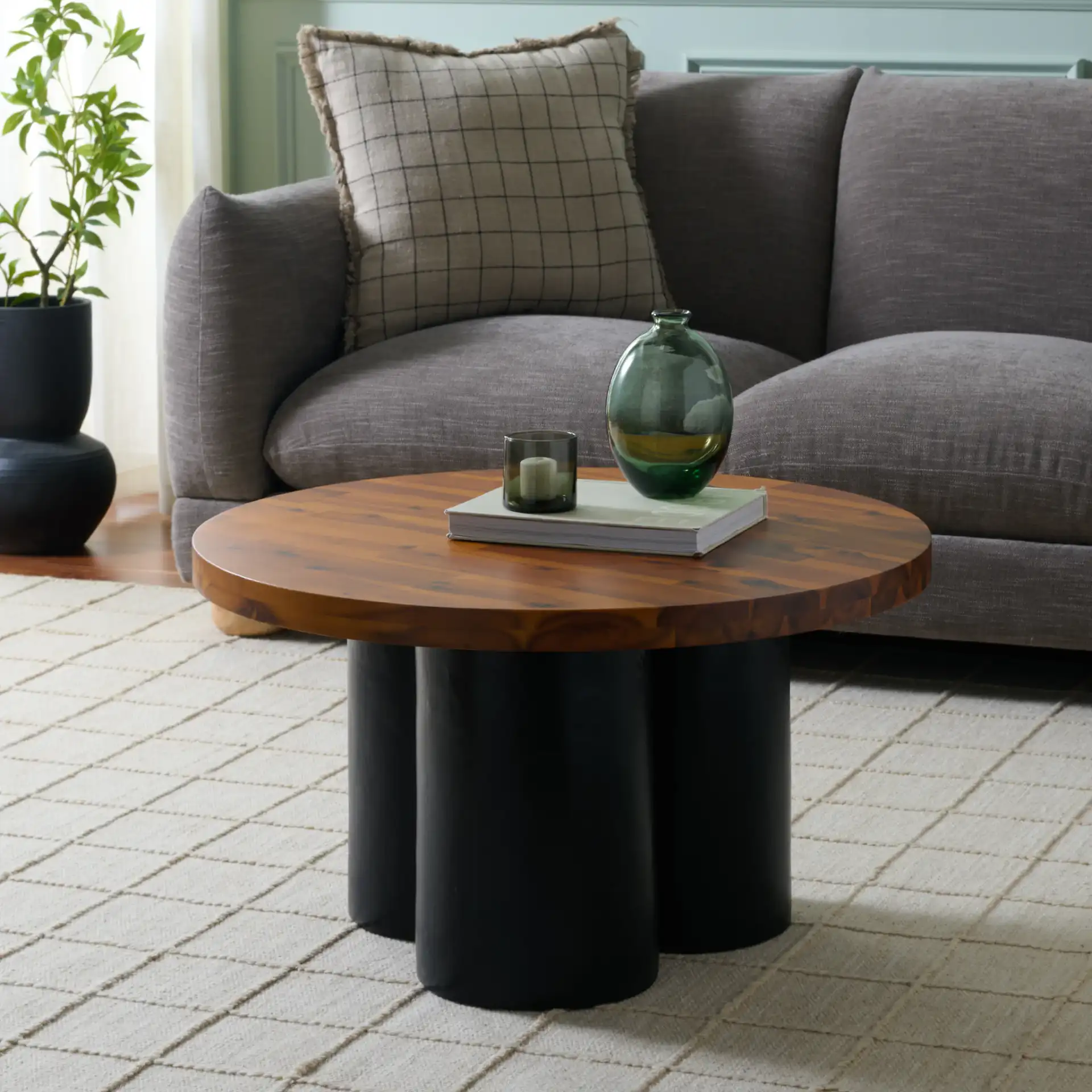 Benvolio Coffee Table in Natural / Charcoal in a styled room