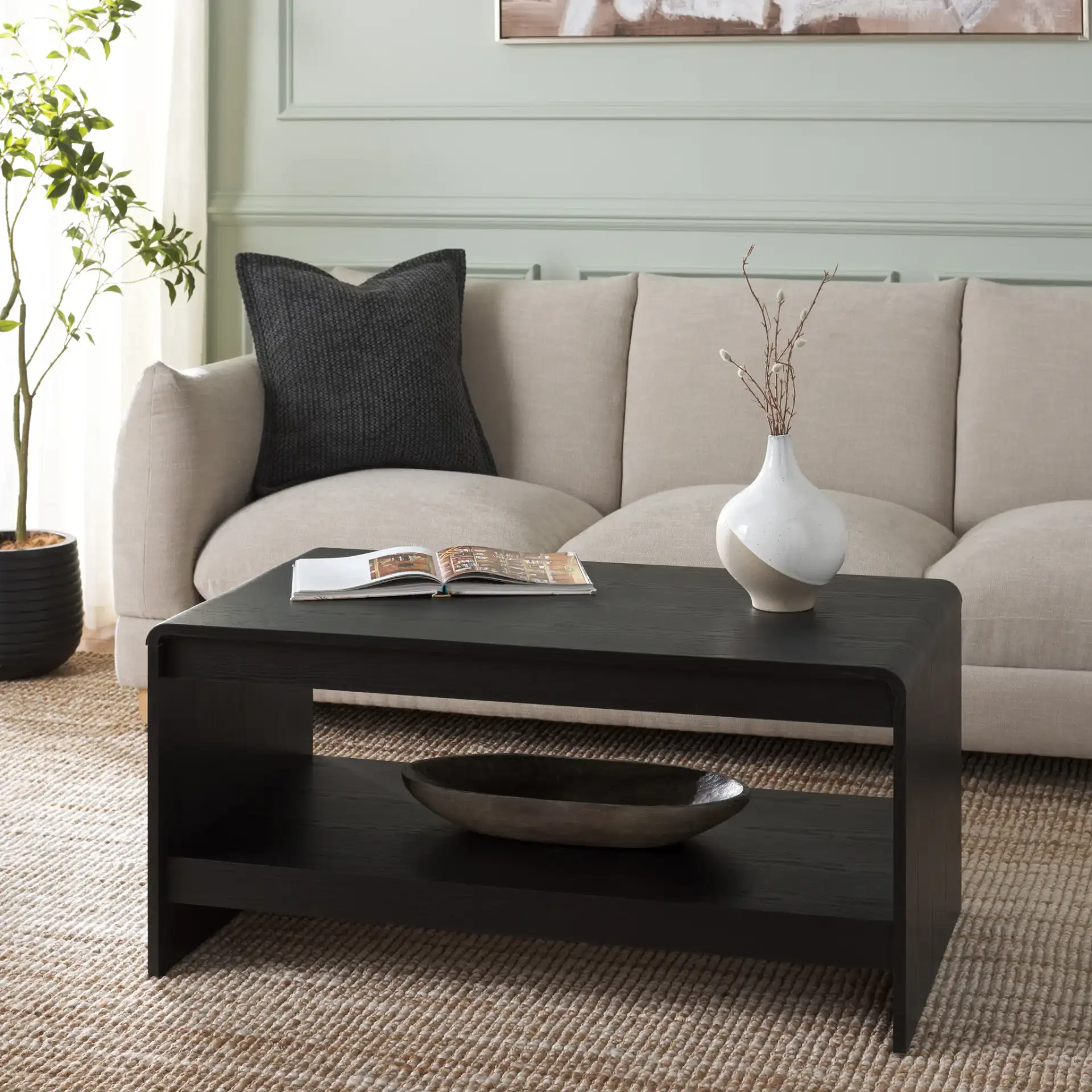 Arsenio Coffee Table in Black in a styled room