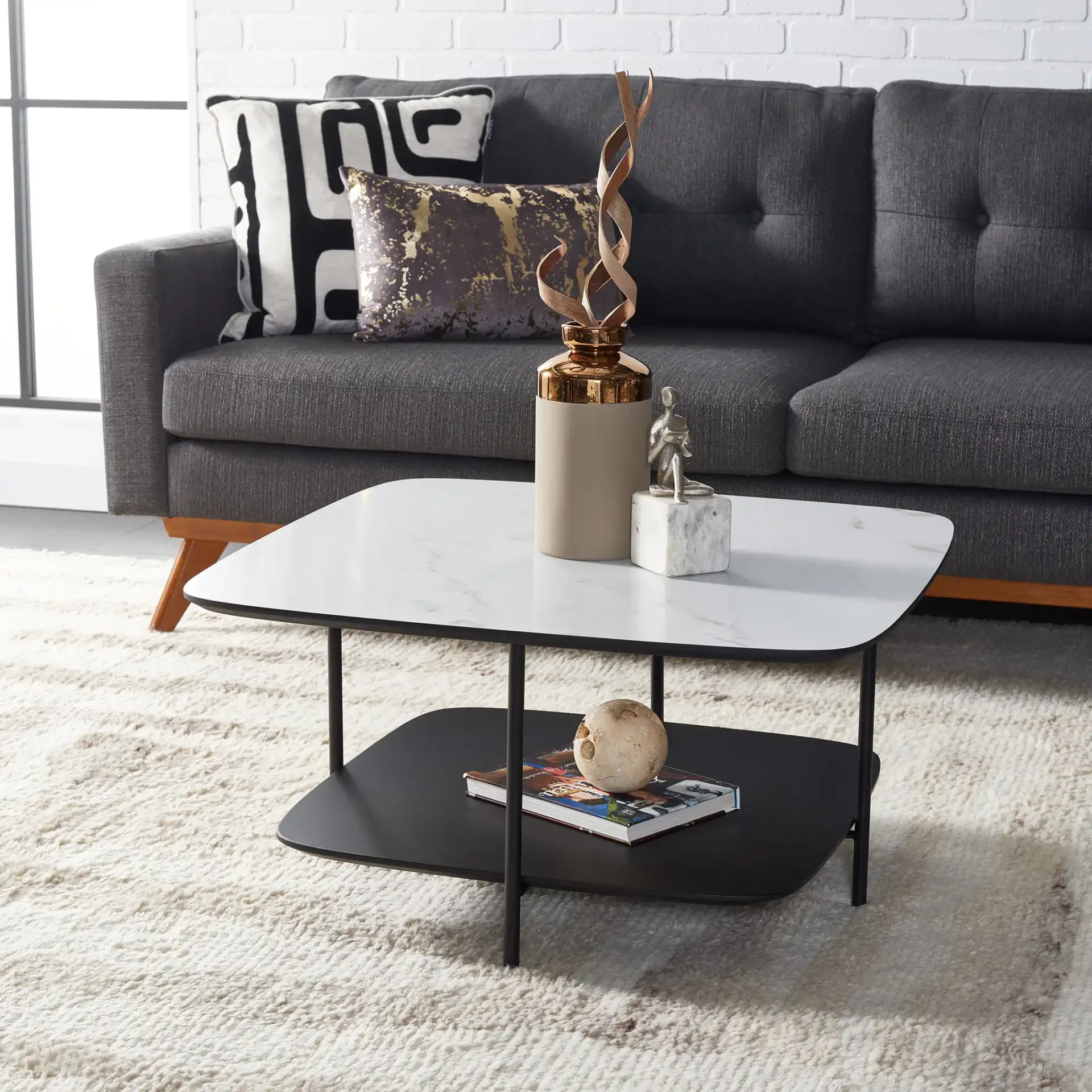 Anzia Coffee Table in White / Black in a styled room