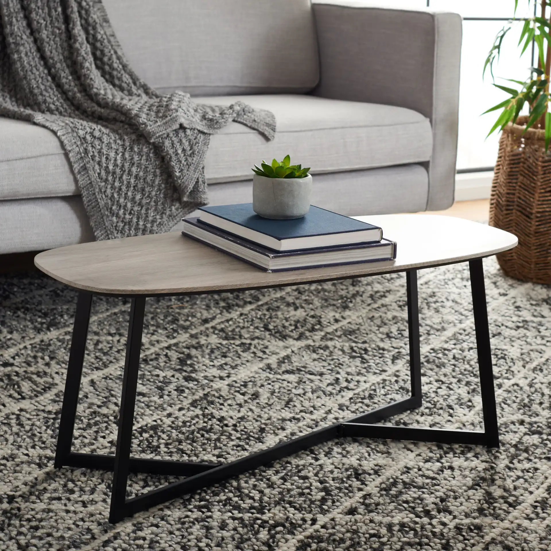 Arial Coffee Table in White / Black in a styled room
