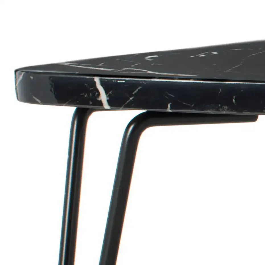Jacky Triangle Coffee Table in Black in a styled room