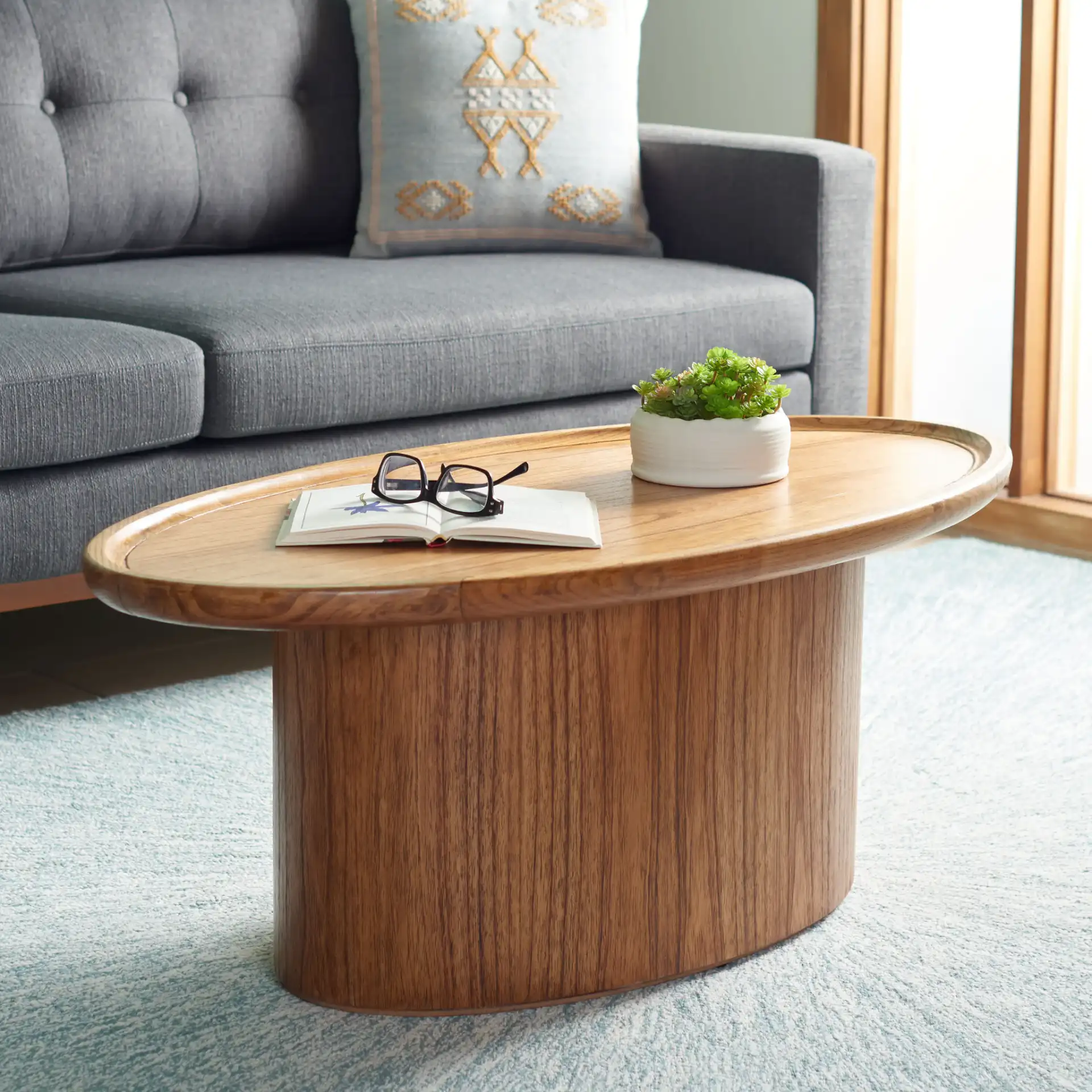 Flyte Oval Coffee Table in Natural in a styled room