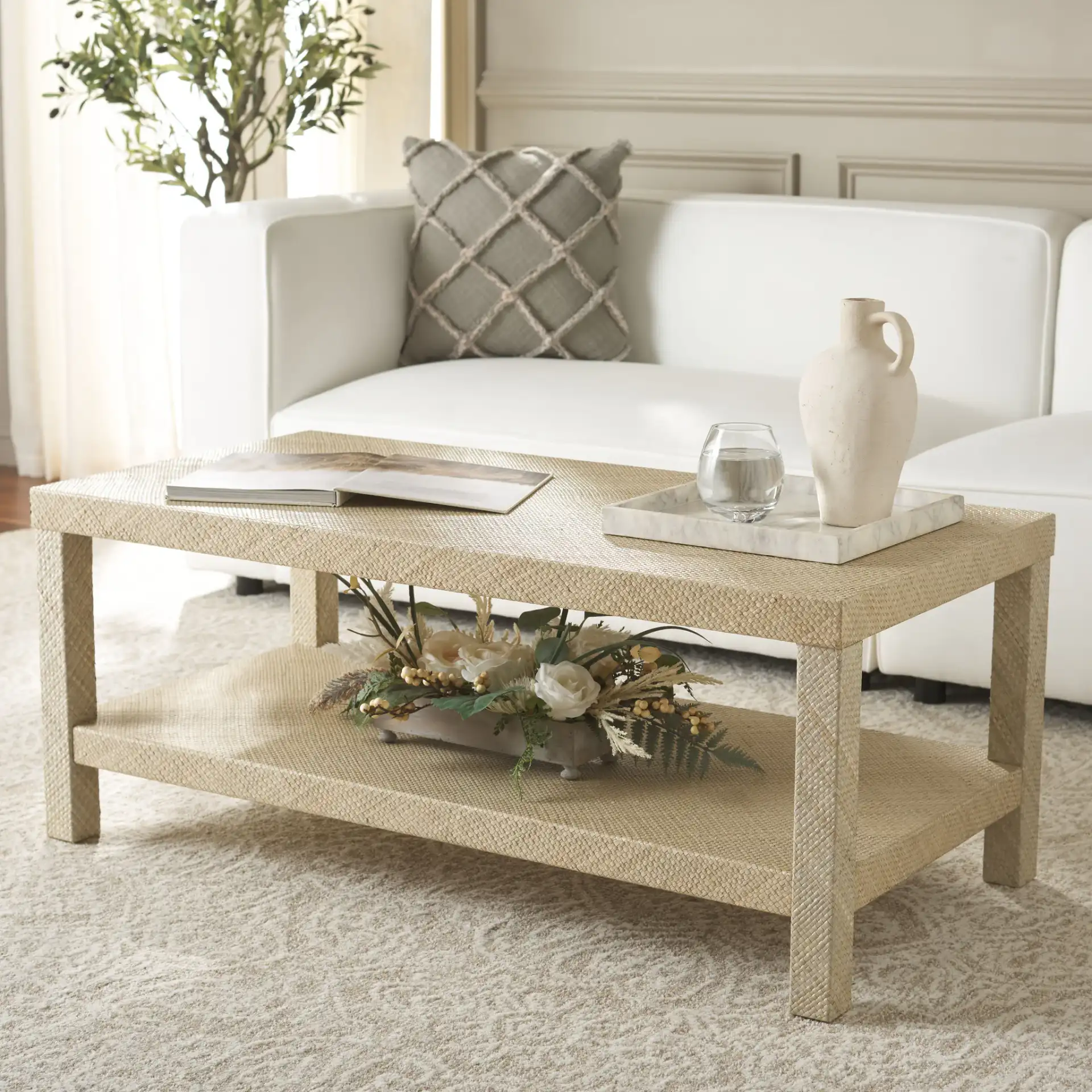 Apis Raffia Coffee Table in Natural in a styled room
