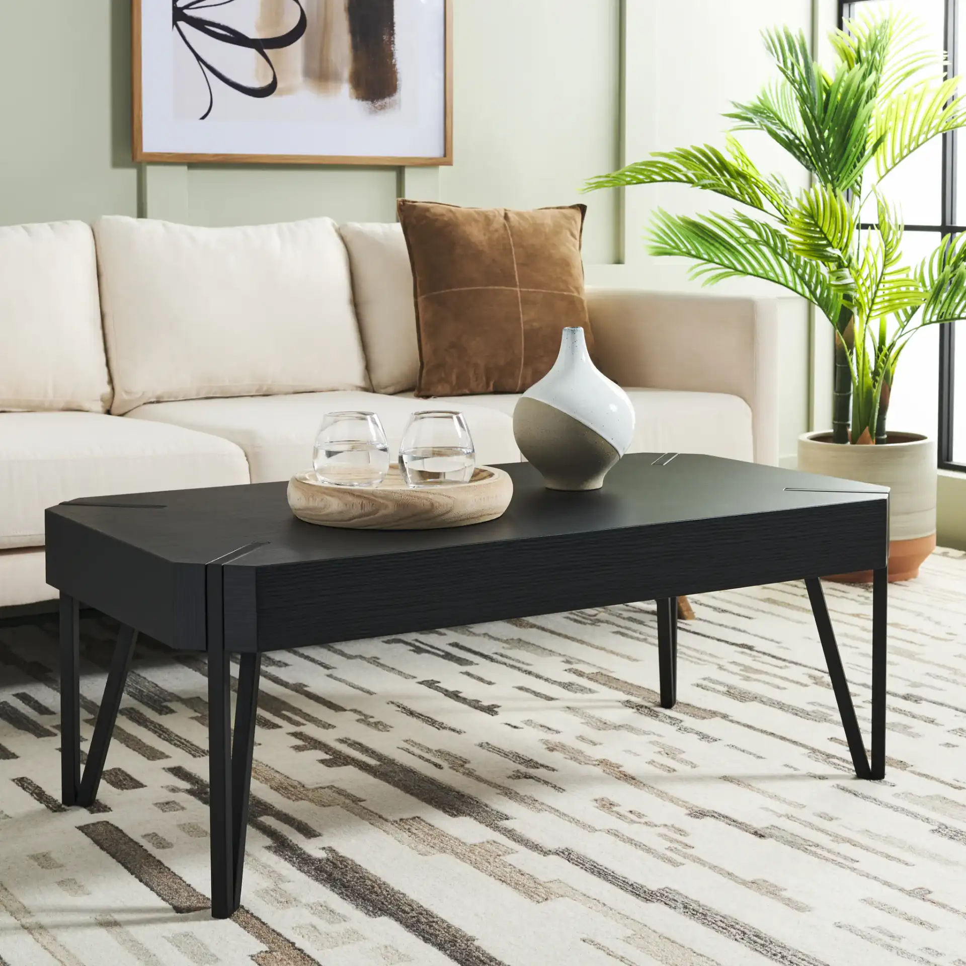 Liann Coffee Table in Black in a styled room