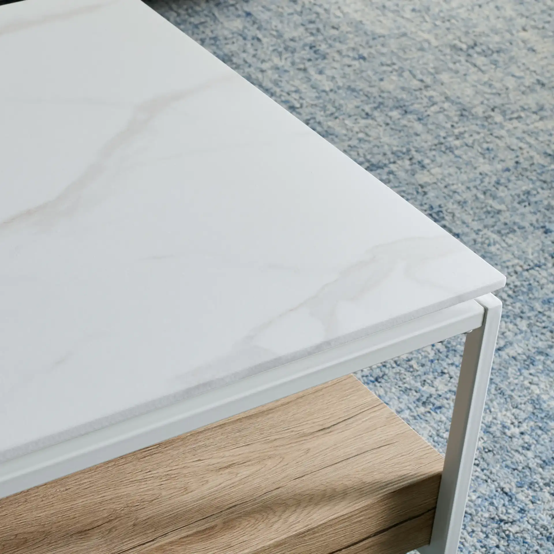 Aurelian Coffee Table in White Faux Marble / Natural in a styled room