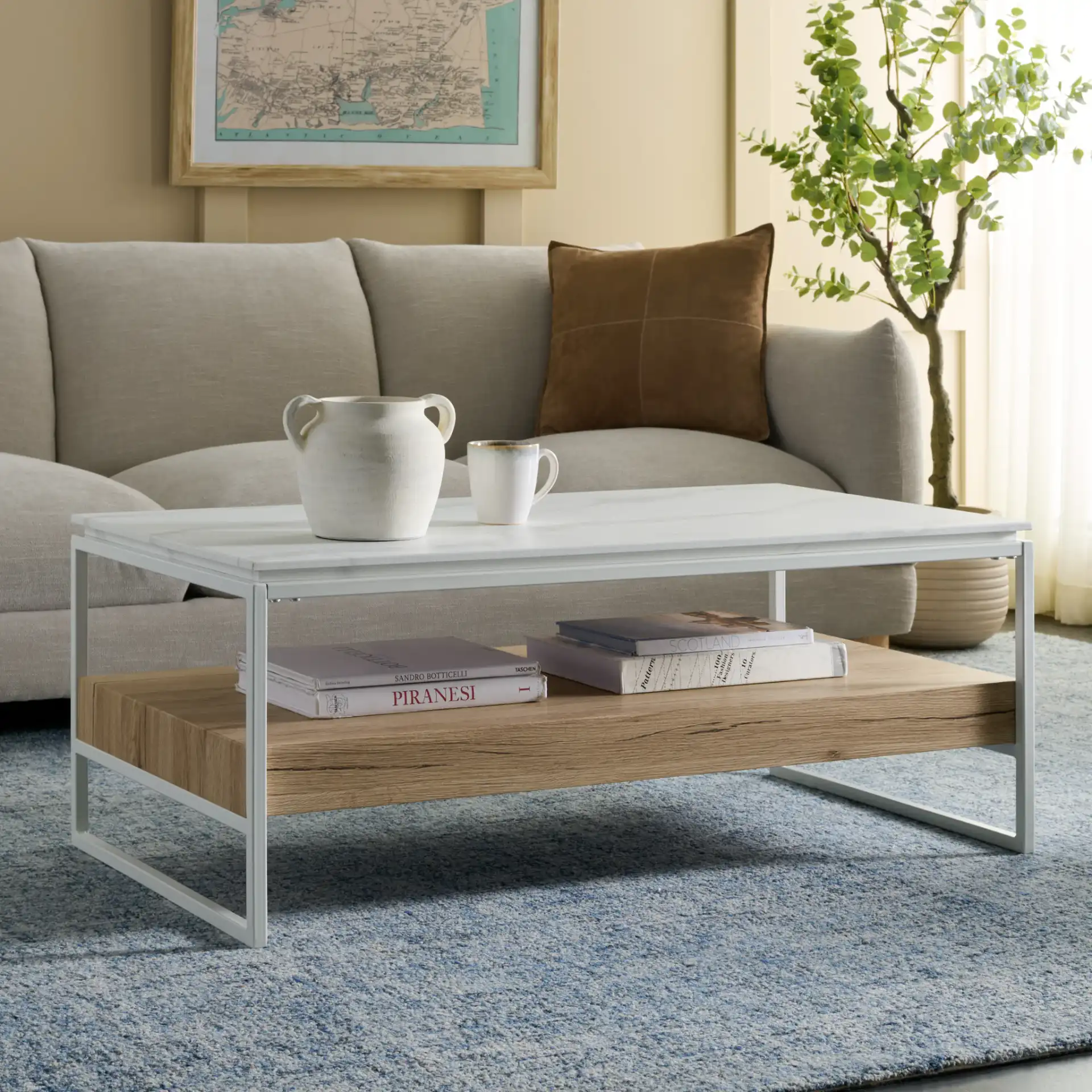 Aurelian Coffee Table in White Faux Marble / Natural in a styled room