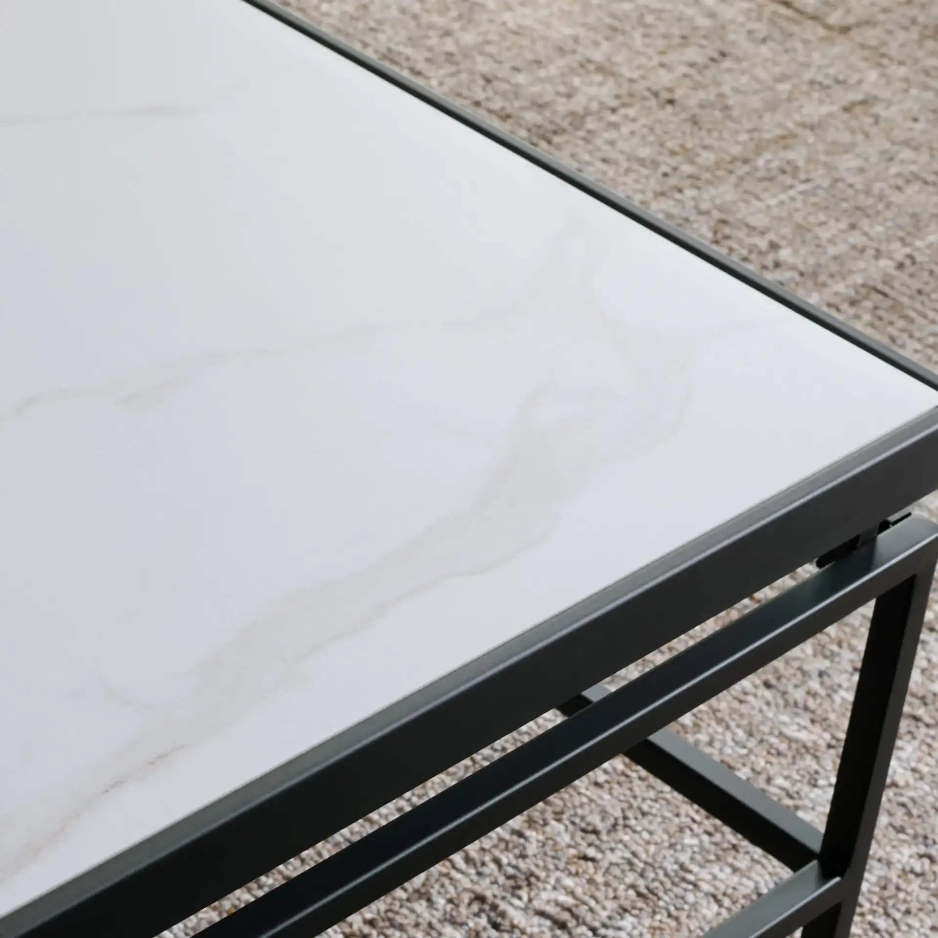 Acelin Coffee Table in White Faux Marble / Black in a styled room
