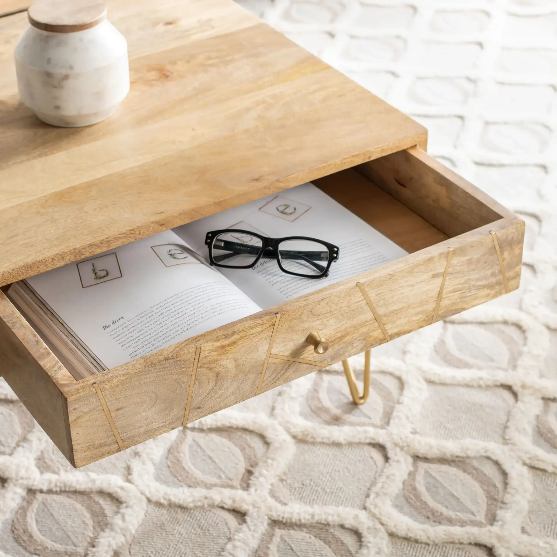 Marigold Coffee Table in Natural / Brass in a styled room