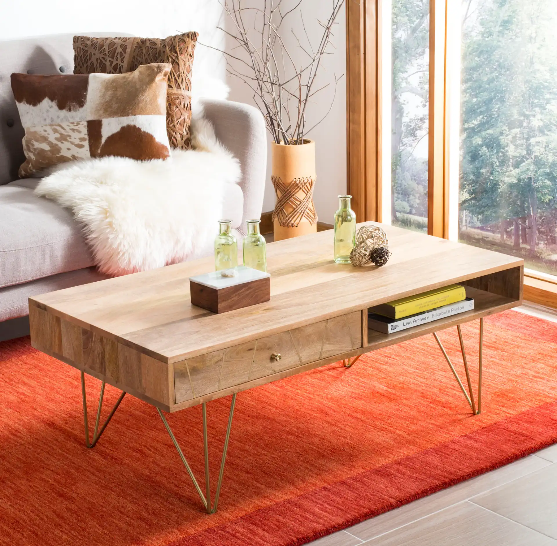 Marigold Coffee Table in Natural / Brass in a styled room