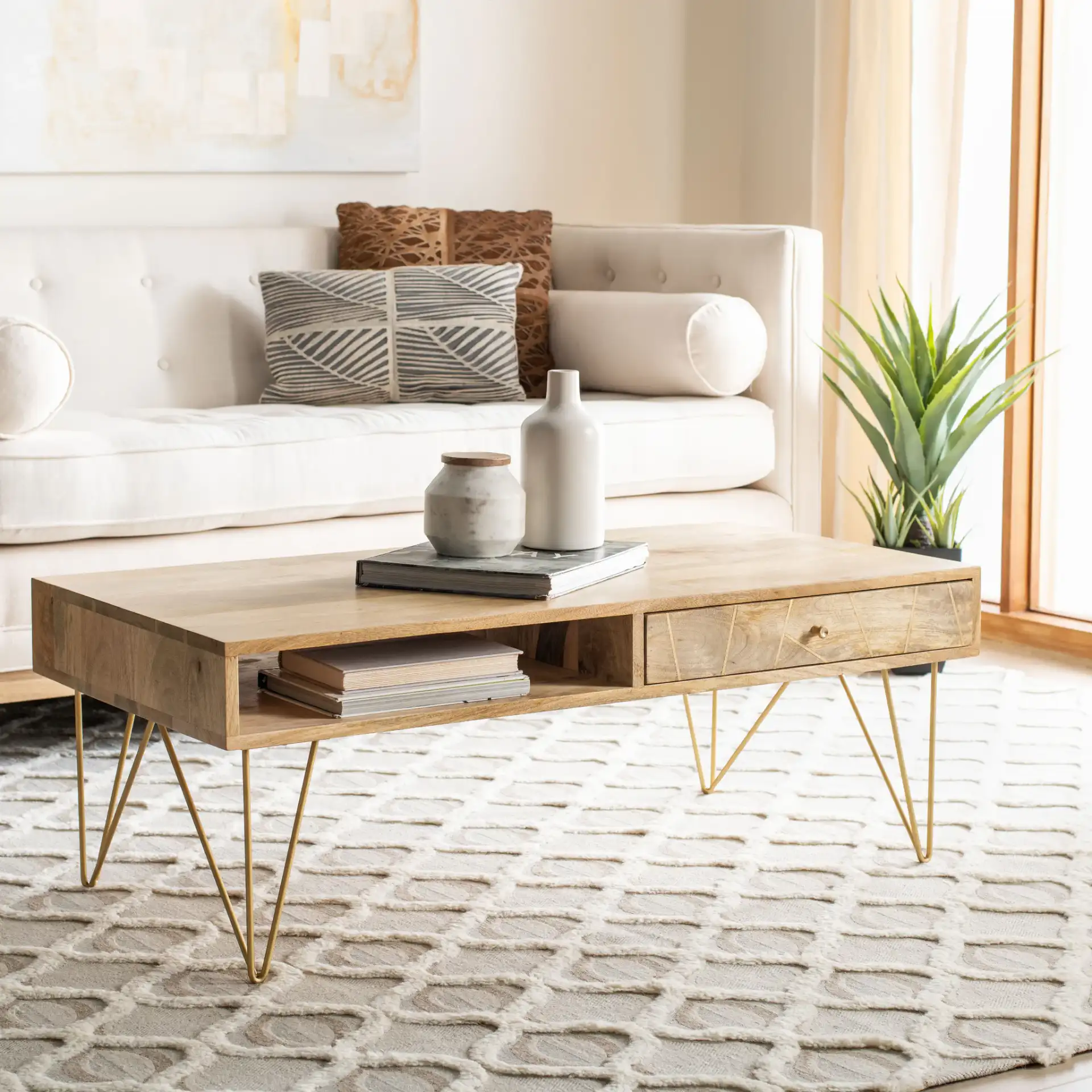 Marigold Coffee Table in Natural / Brass in a styled room