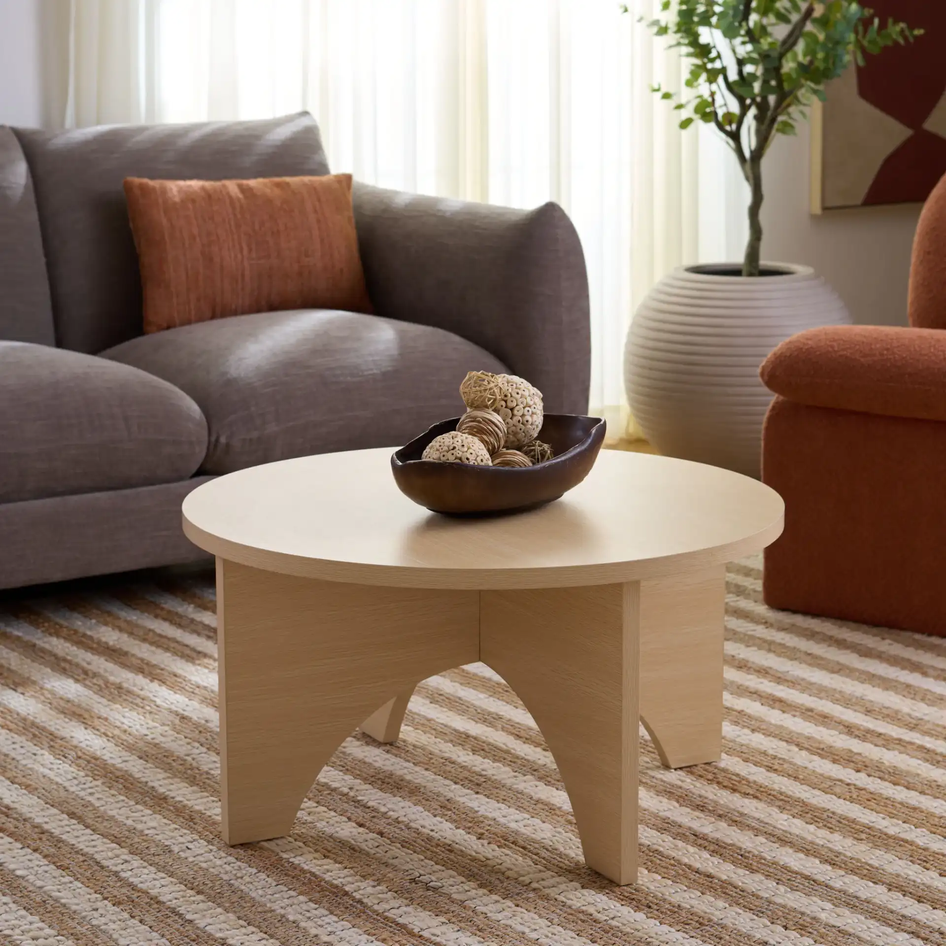 Eustace Coffee Table in Sand in a styled room