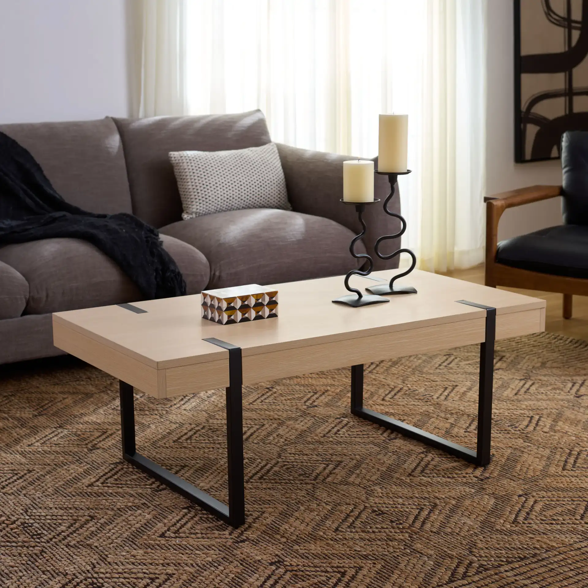 Klausner Coffee Table in Sand / Black in a styled room