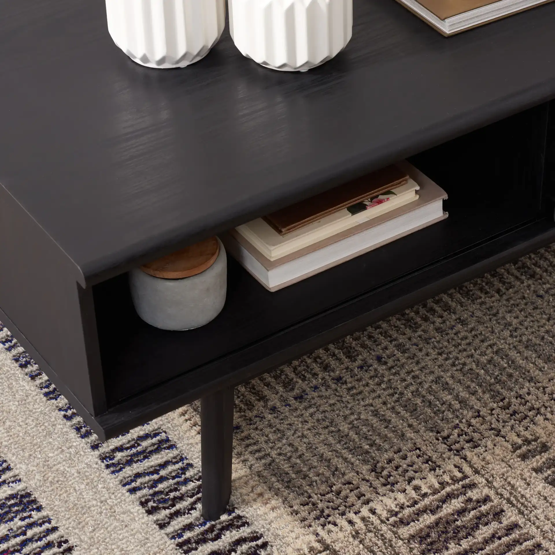 Rori Two-Door Coffee Table in Black in a styled room