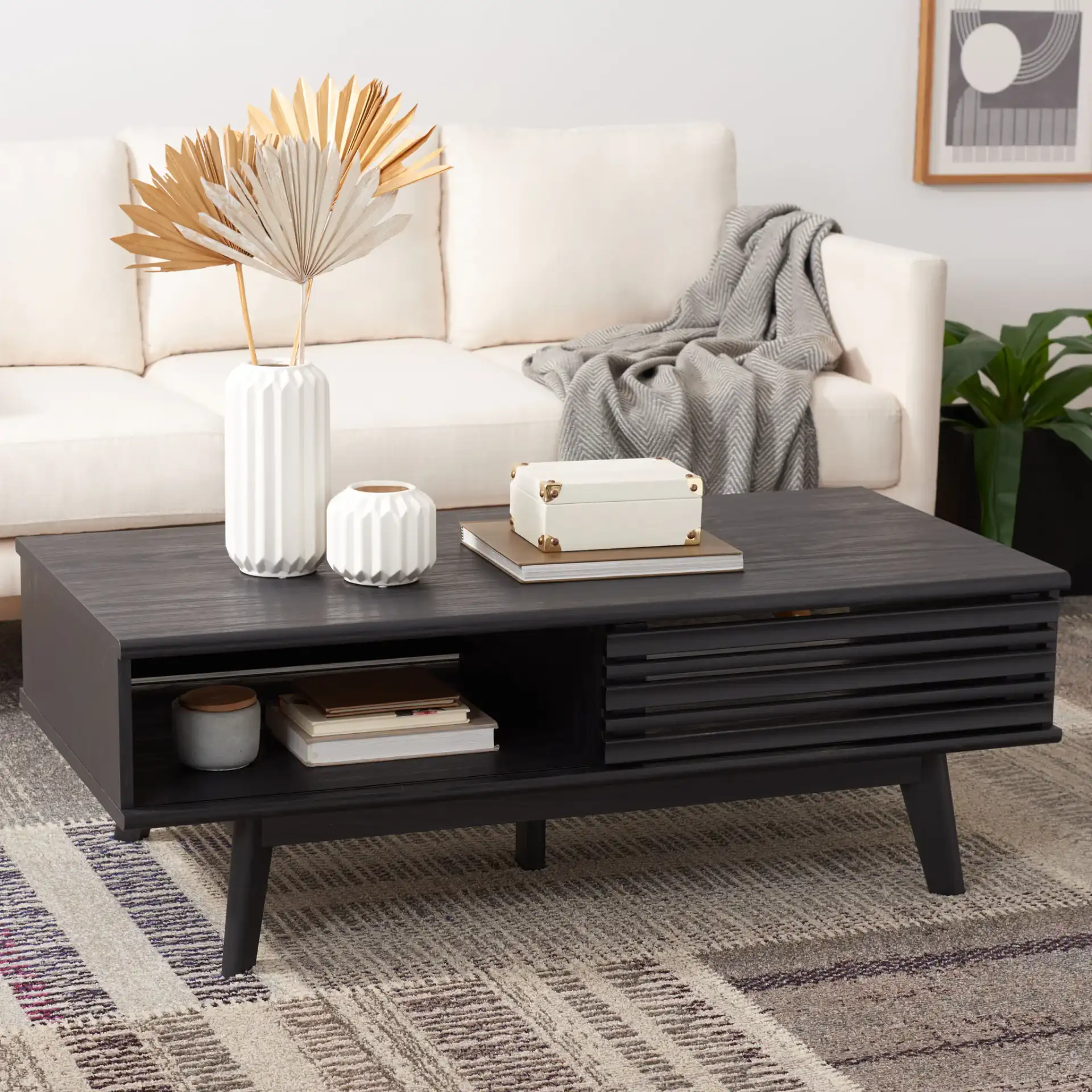 Rori Two-Door Coffee Table in Black in a styled room