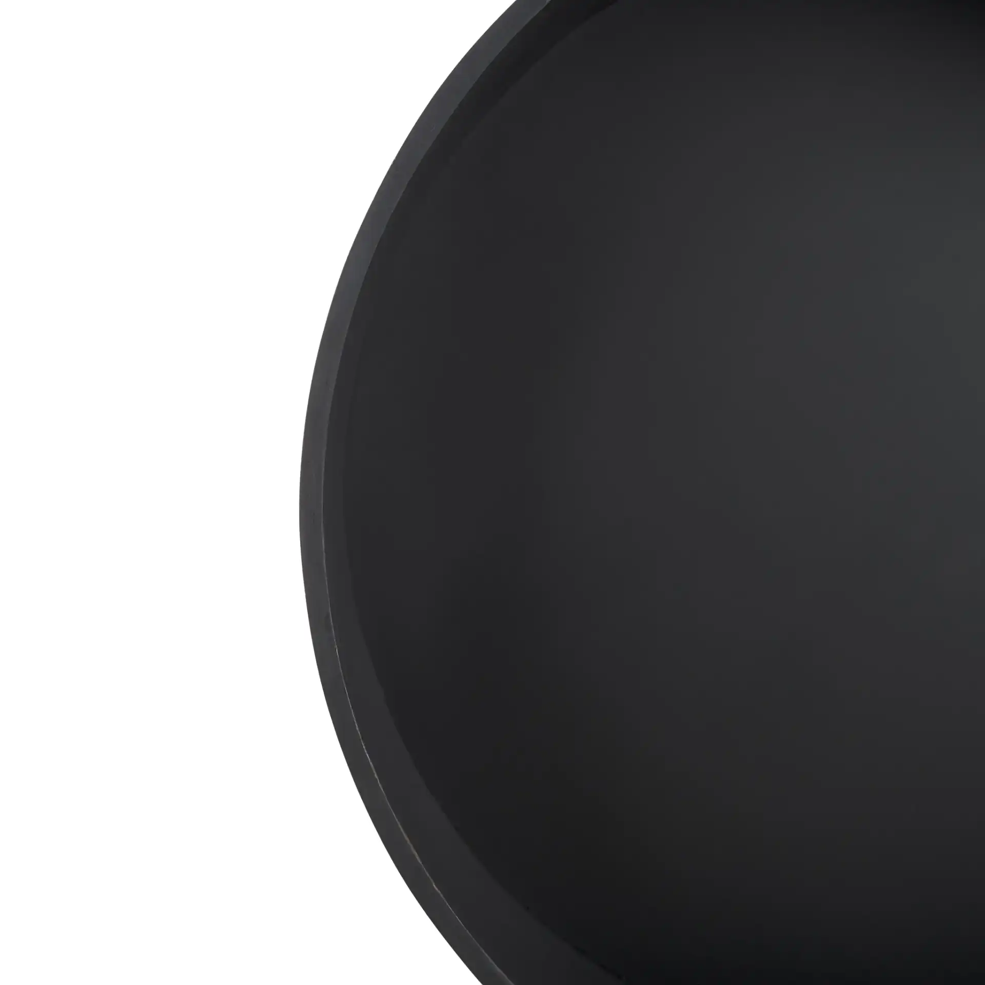 Rafaela Round Coffee Table in Black in a styled room