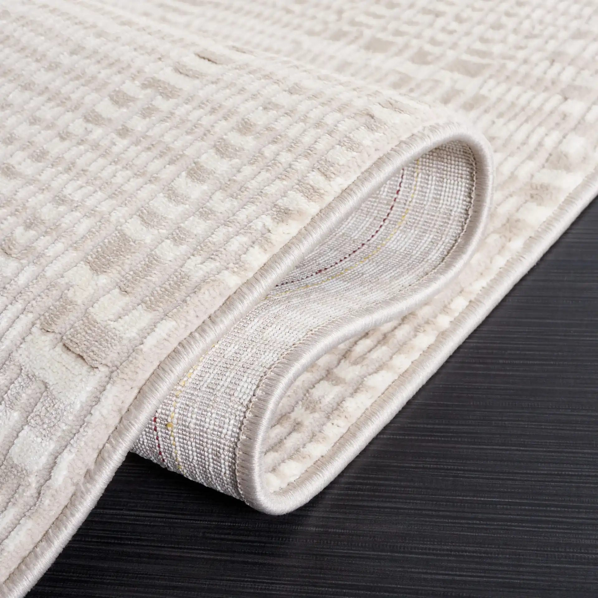 Continental Broken Grid Rug in Ivory / Beige in a styled room