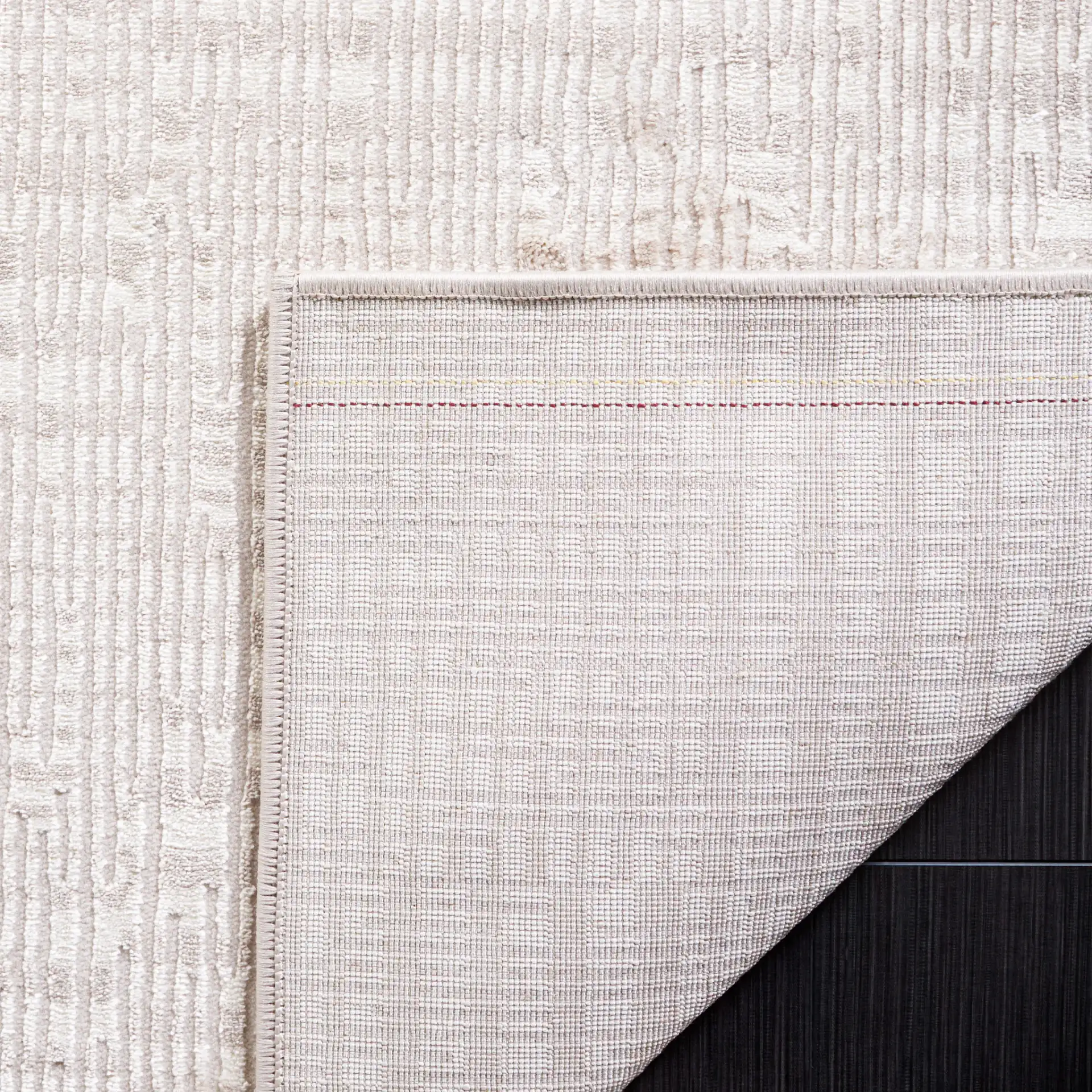 Continental Broken Grid Rug in Ivory / Beige in a styled room